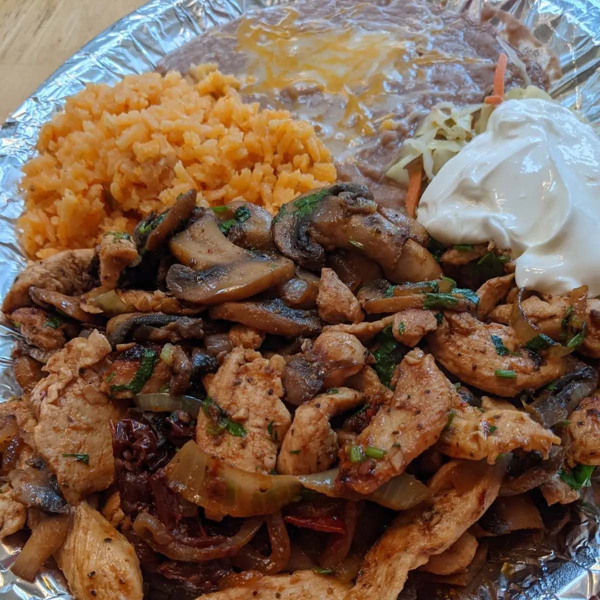 SHREDDED CHICKEN TOSTADA