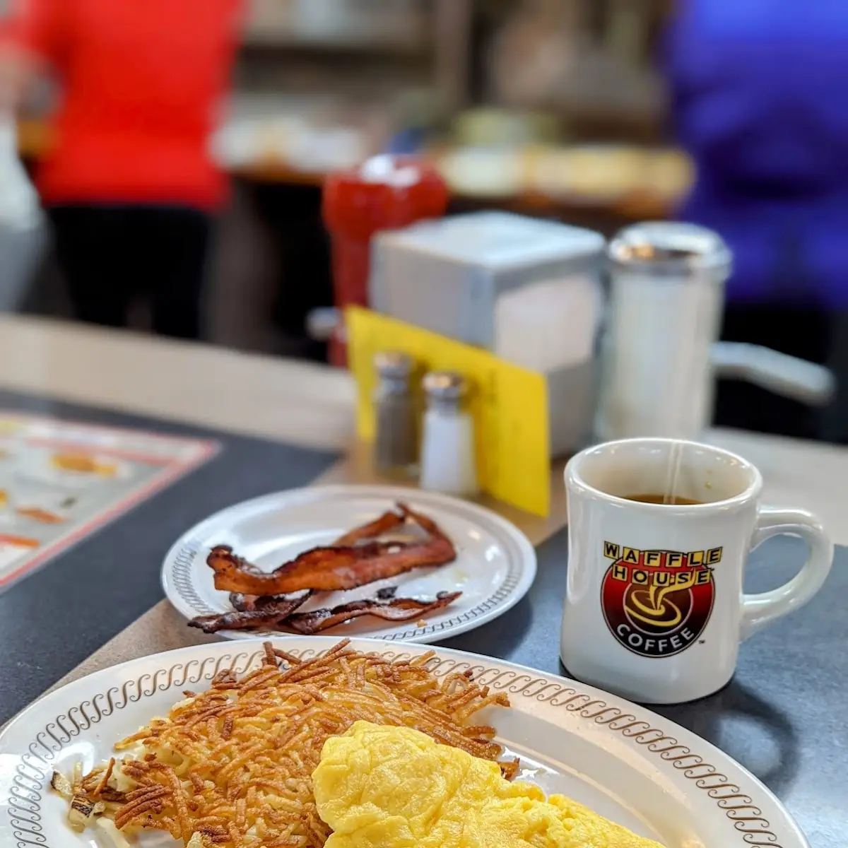 Cheese Omelette Hash Browns and Burnt Bacon