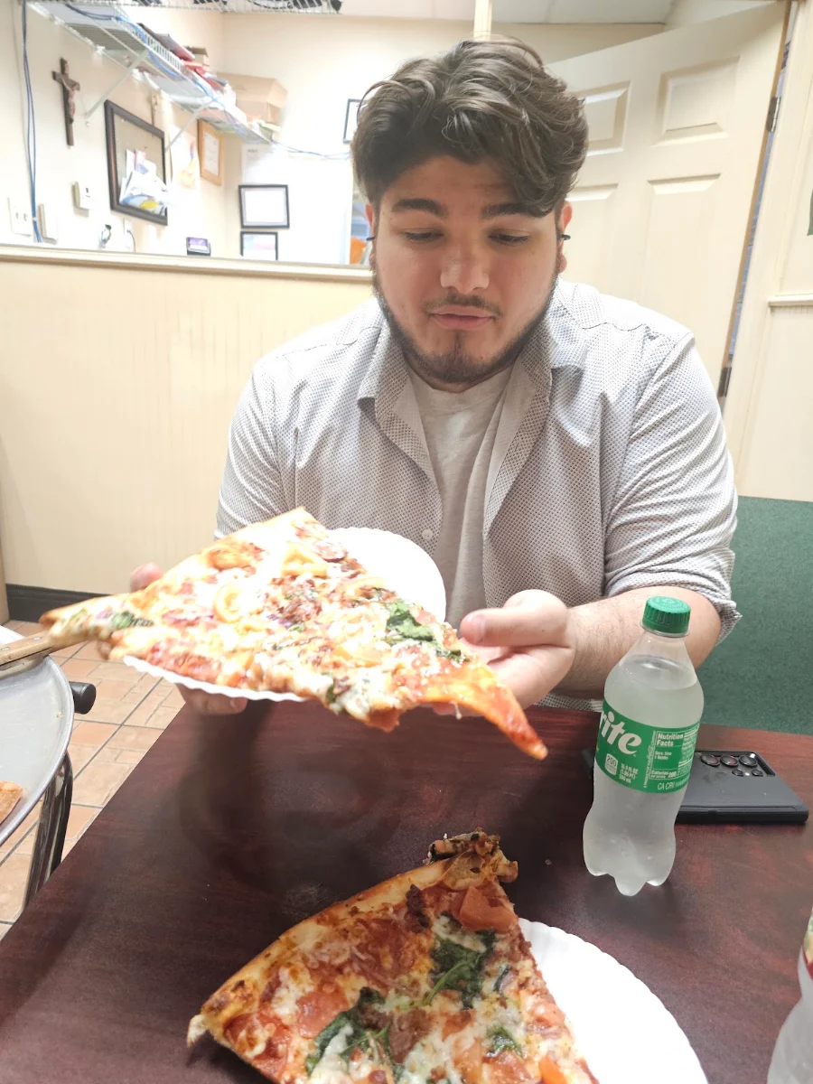 Any Specialty Pizza Slice