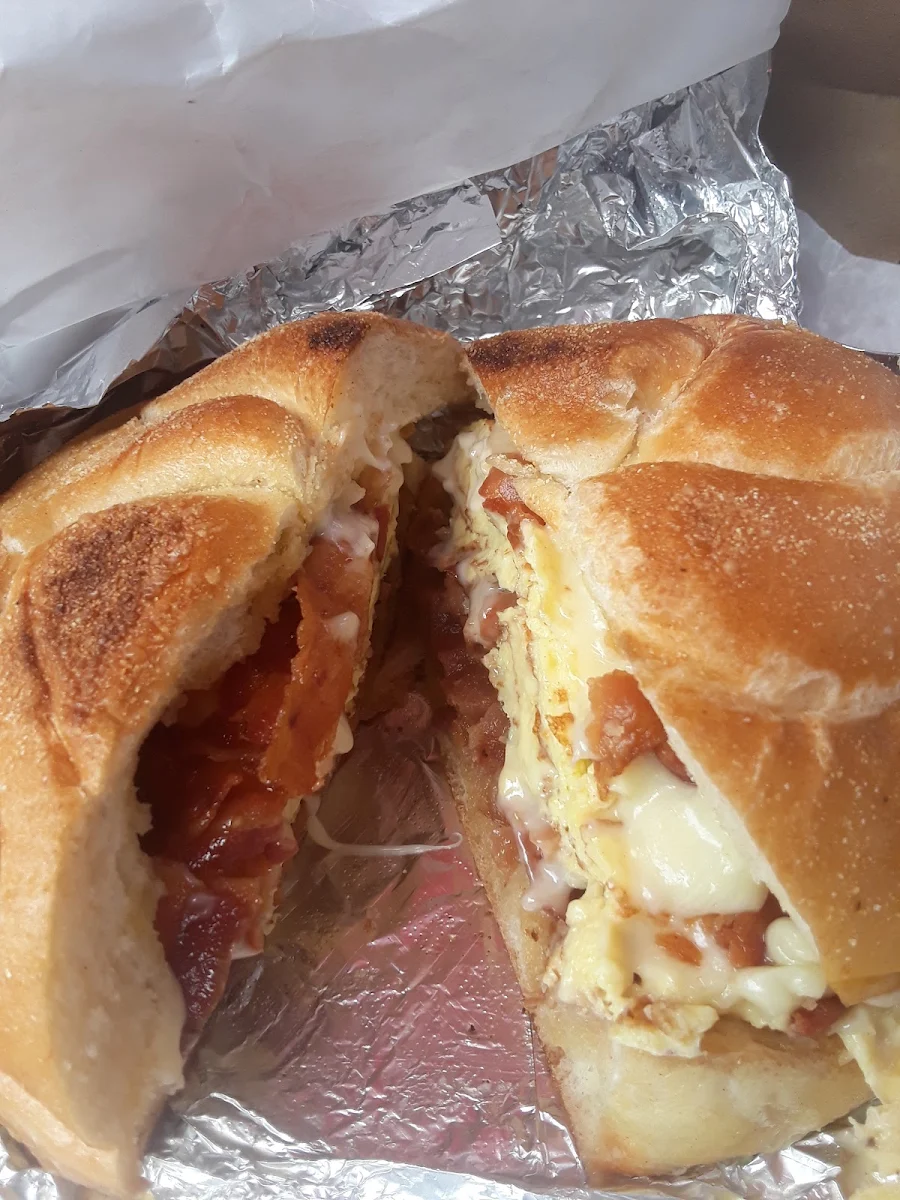 Bacon Egg and Cheese on a Kaiser Roll Salt Pepper Ketchup and Mayo