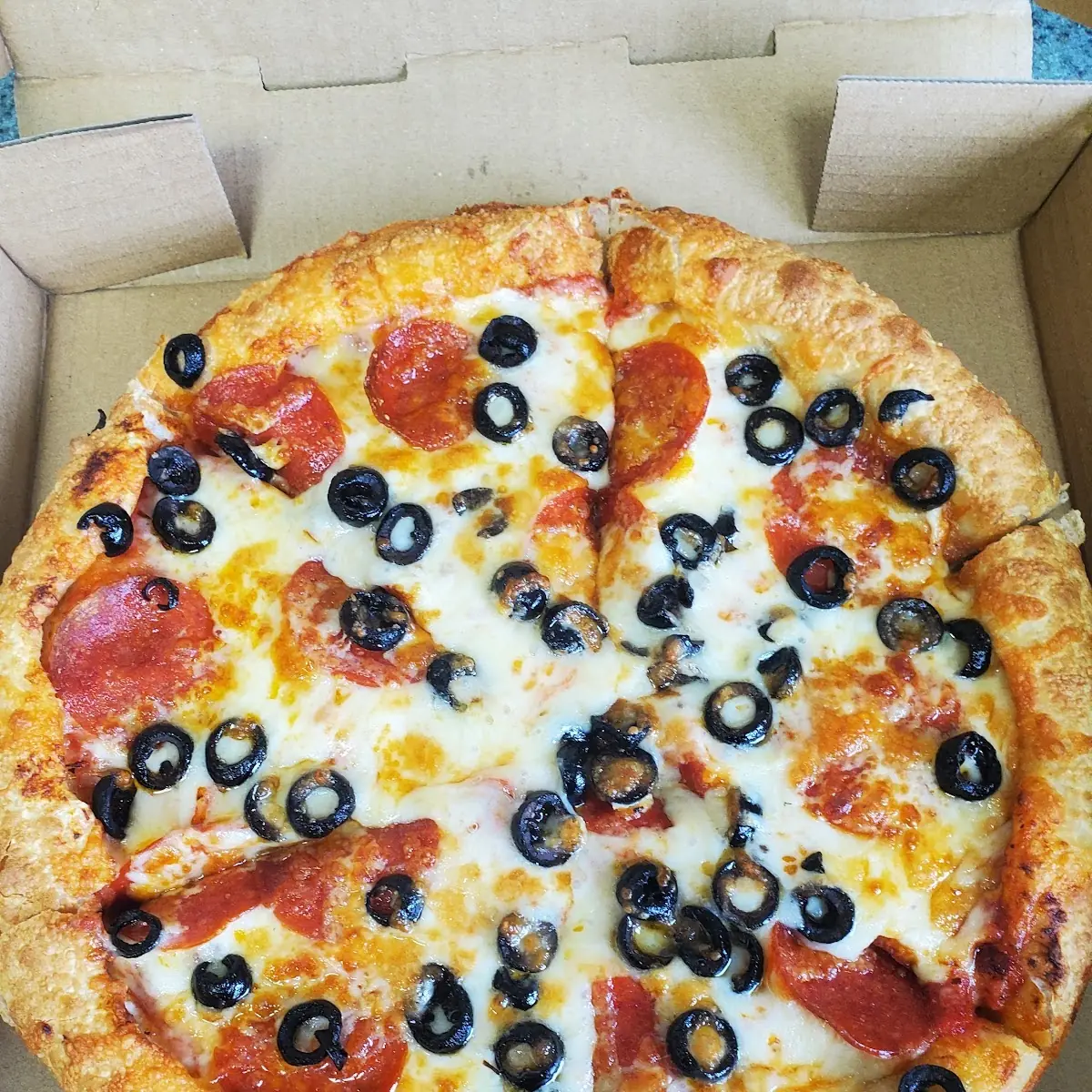 Pepperoni and Black Olive Pizza
