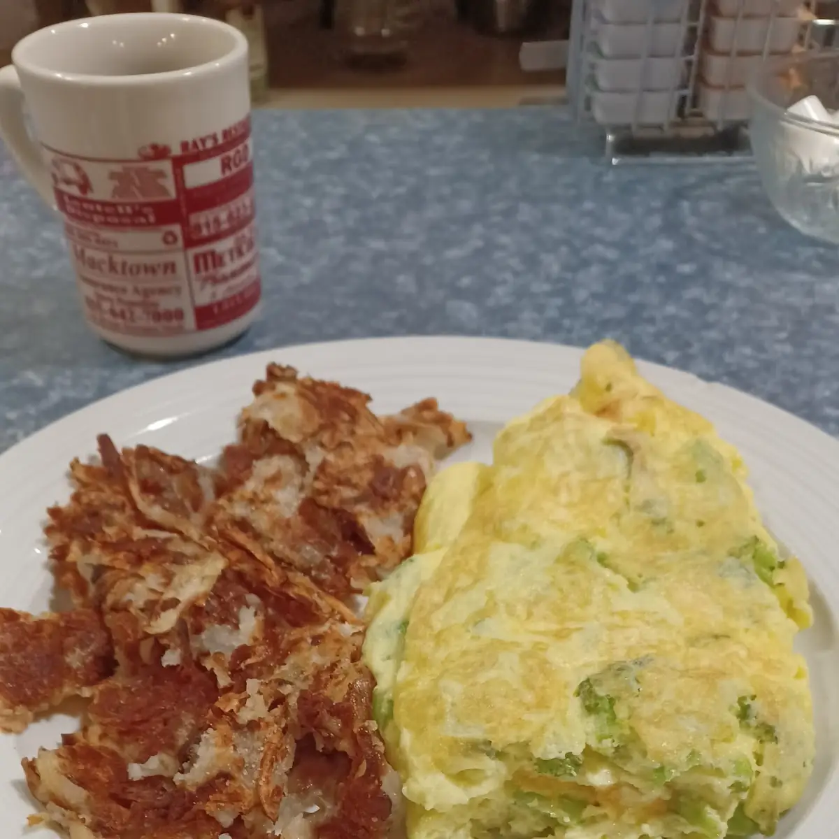 Broccoli and Cheddar Omelette with Hash Browns