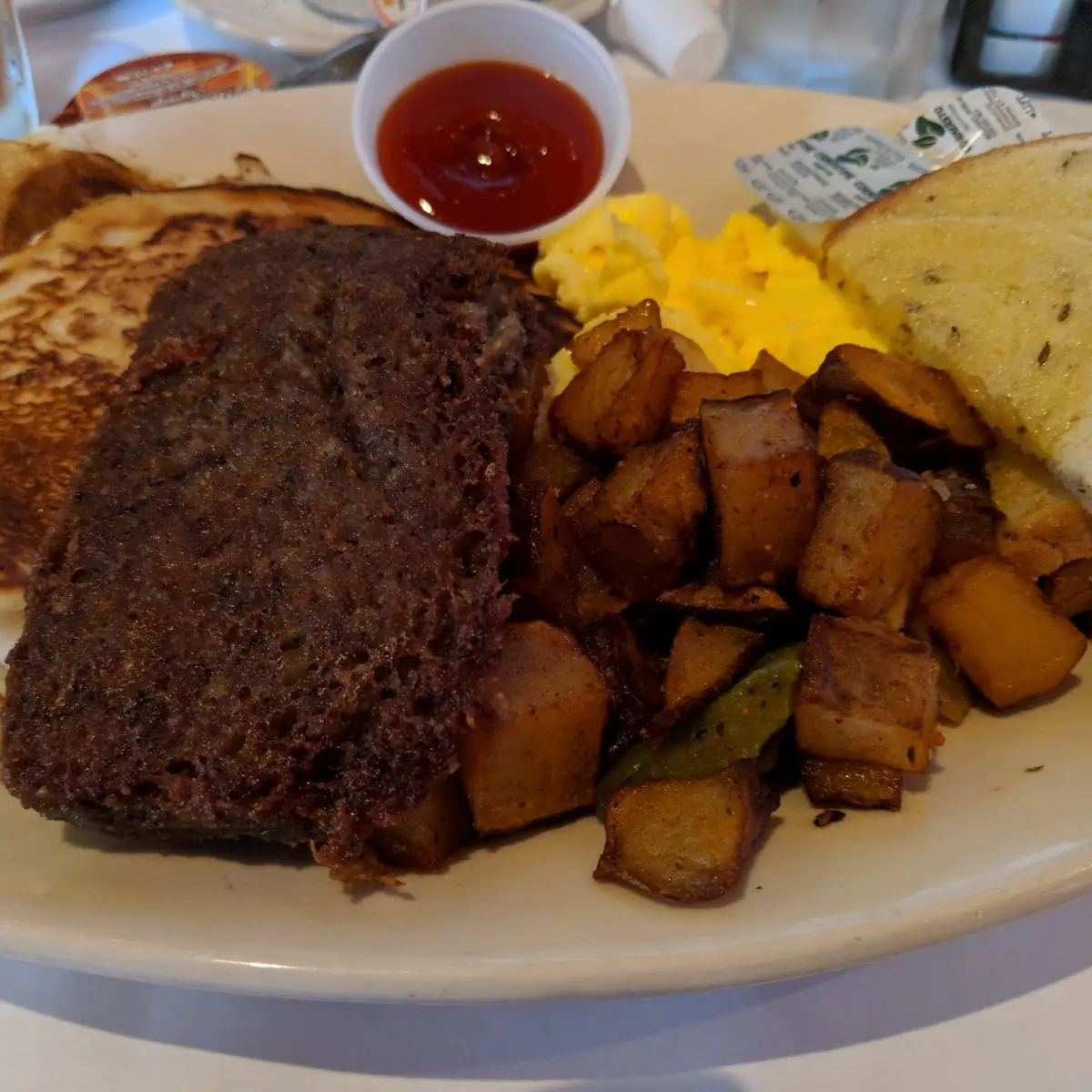 Pancakes Scrambled Eggs Scrapple & Rye Toast