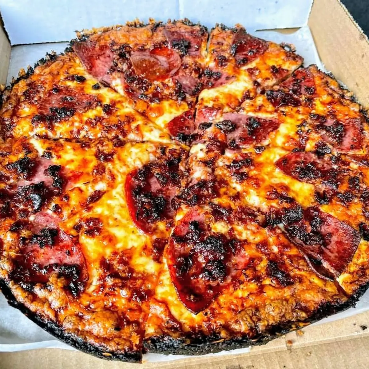 Linguica Pizza with Extra Cheese Well Done