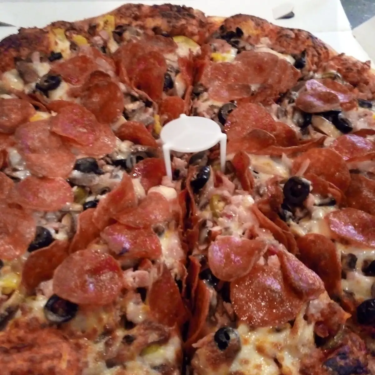 Specialty Pizza or 9 Bomber