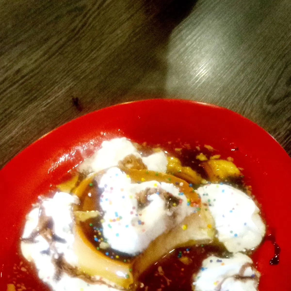 Flan with Whipped Cream and Sprinkles