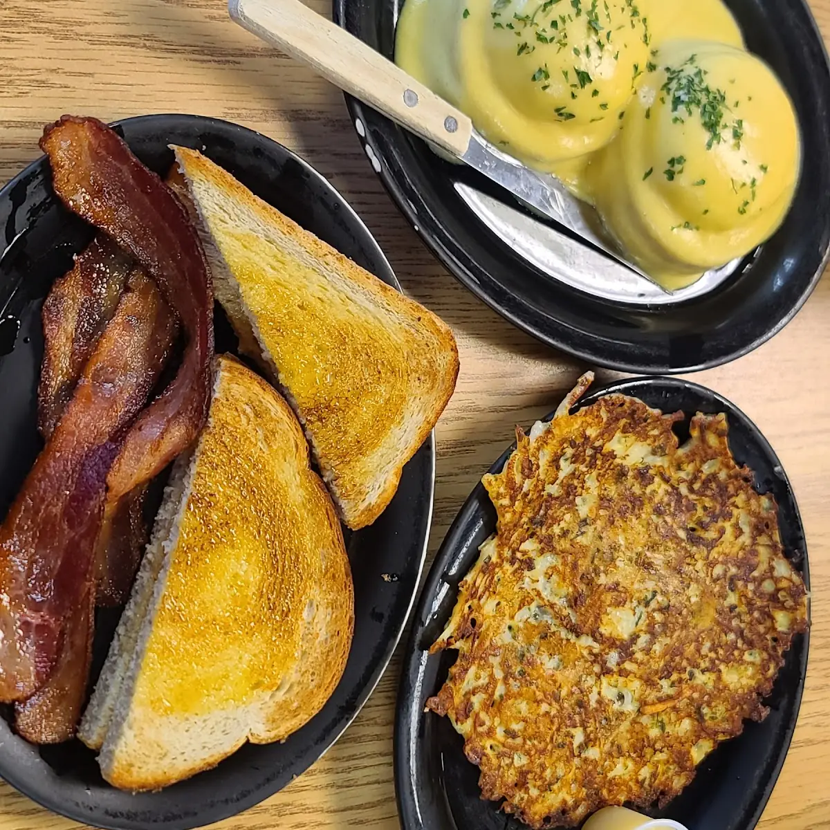 Eggs Benedict Sourdough Toast Bacon and a Potato Pancake