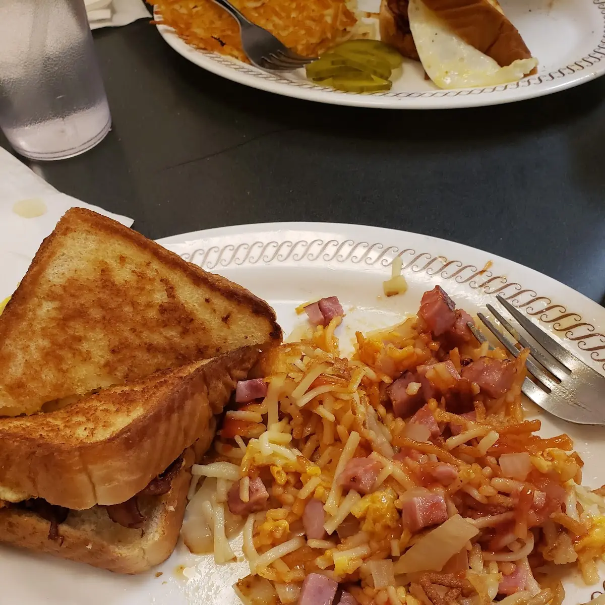 Bacon Egg and Cheese on Texas Toast with Hashbrowns