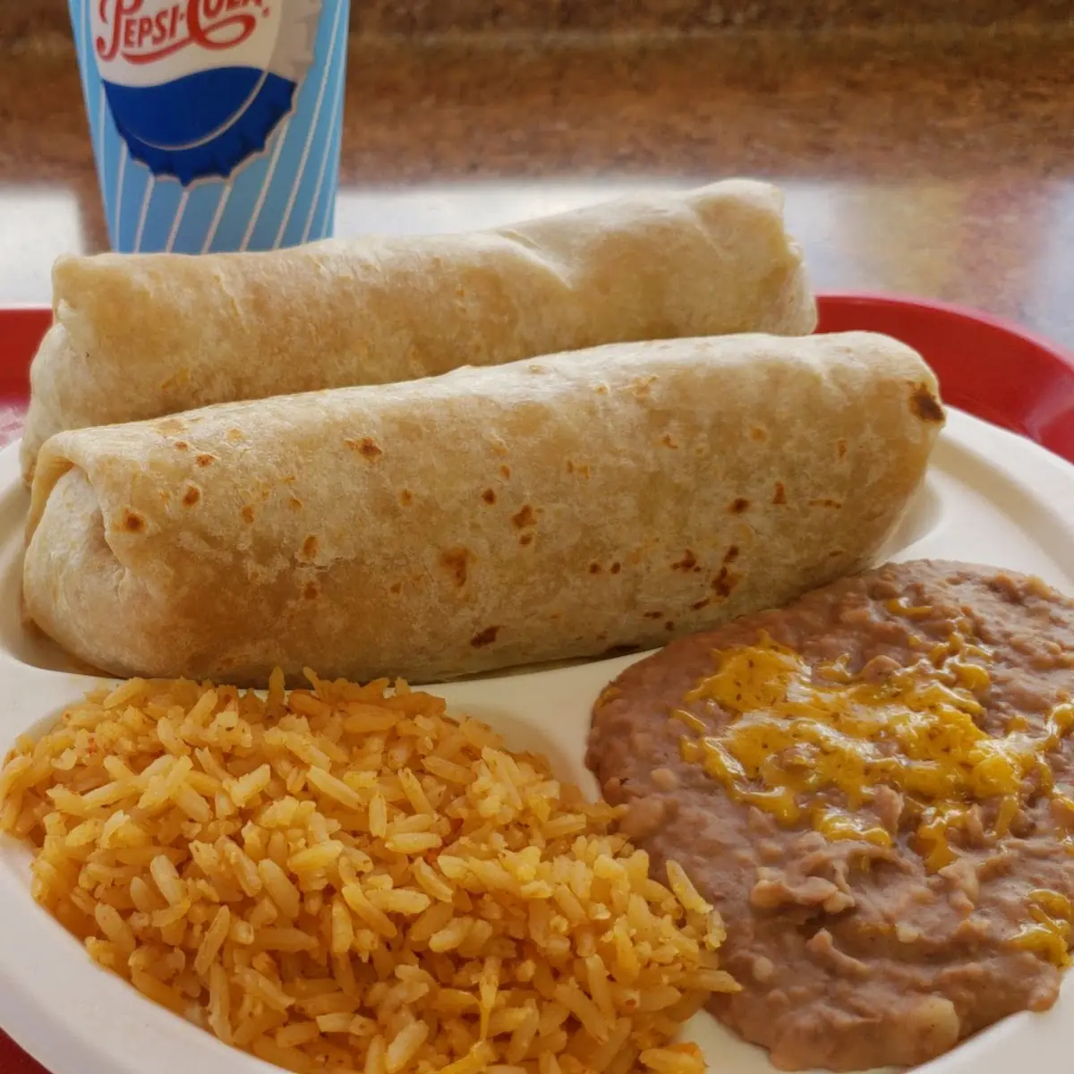 Two Chicken Burritos Combo with a Fish Taco