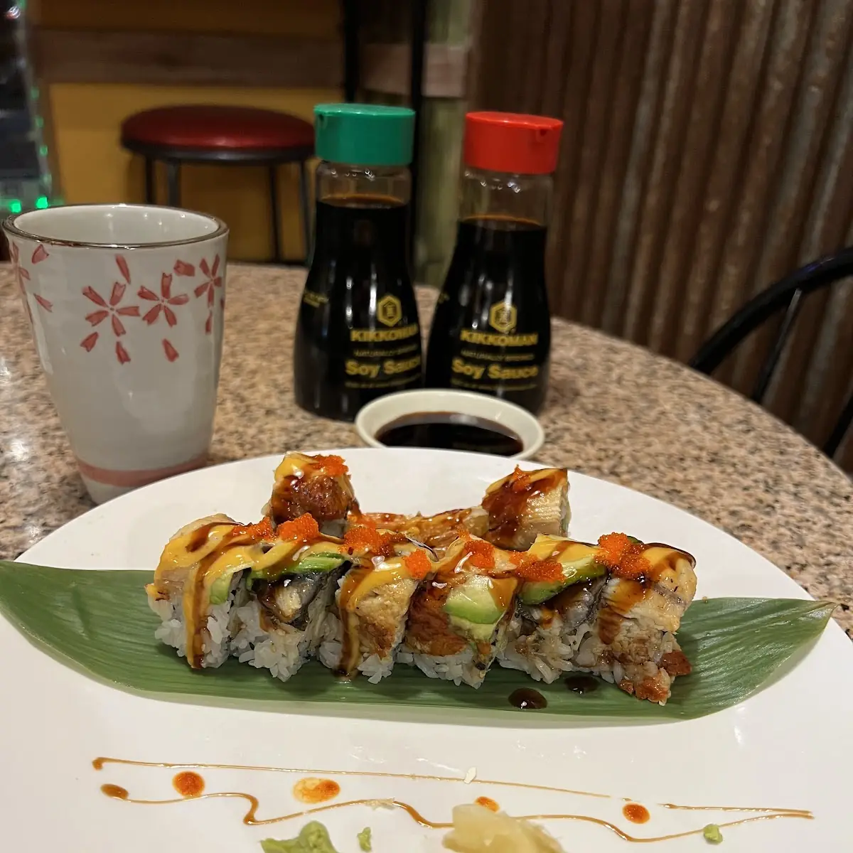 Left Spicy Scallop Roll Right Angel Roll
