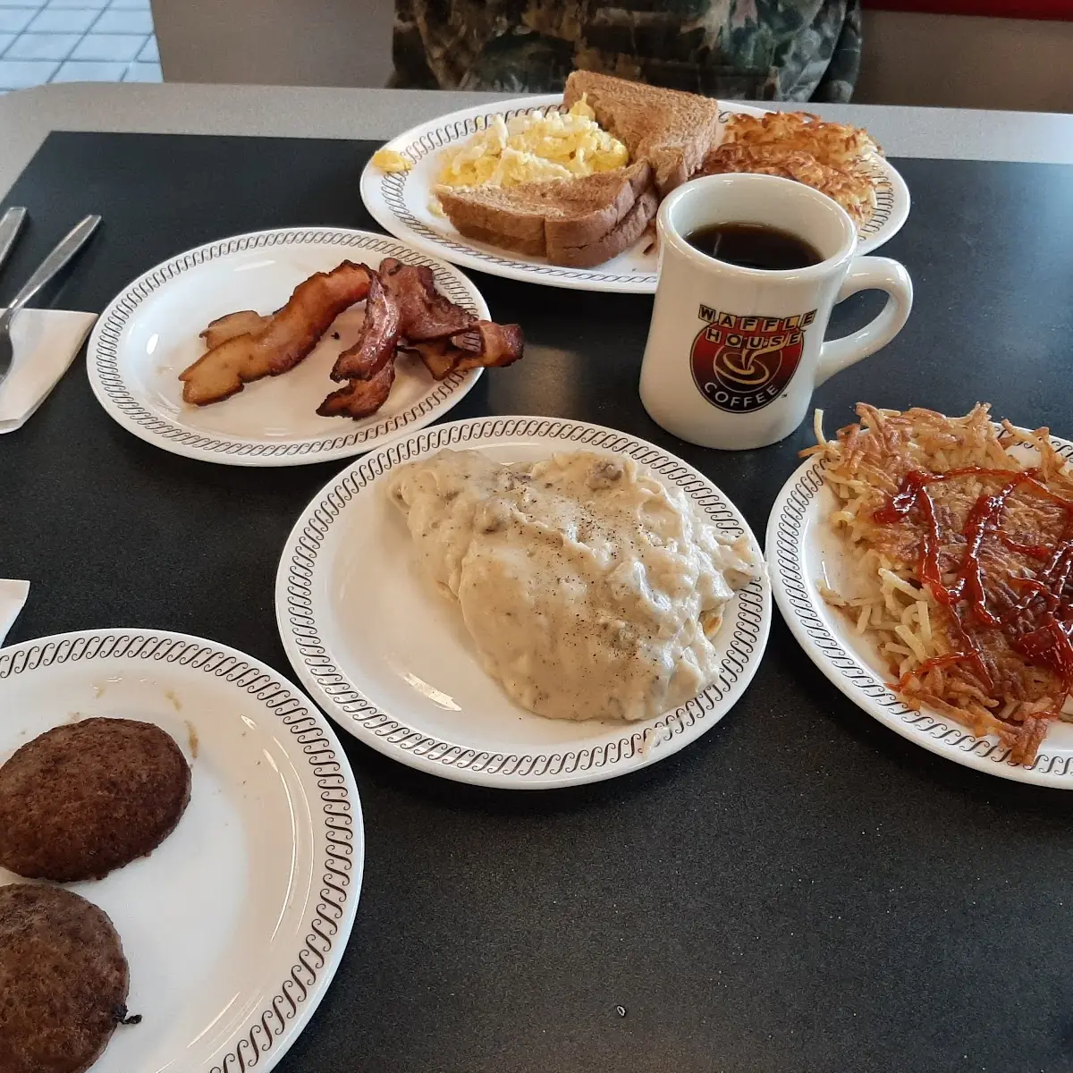 Biscuits and Gravy Crispy Hash Brown's Scrambled Eggs Bacon and Toast