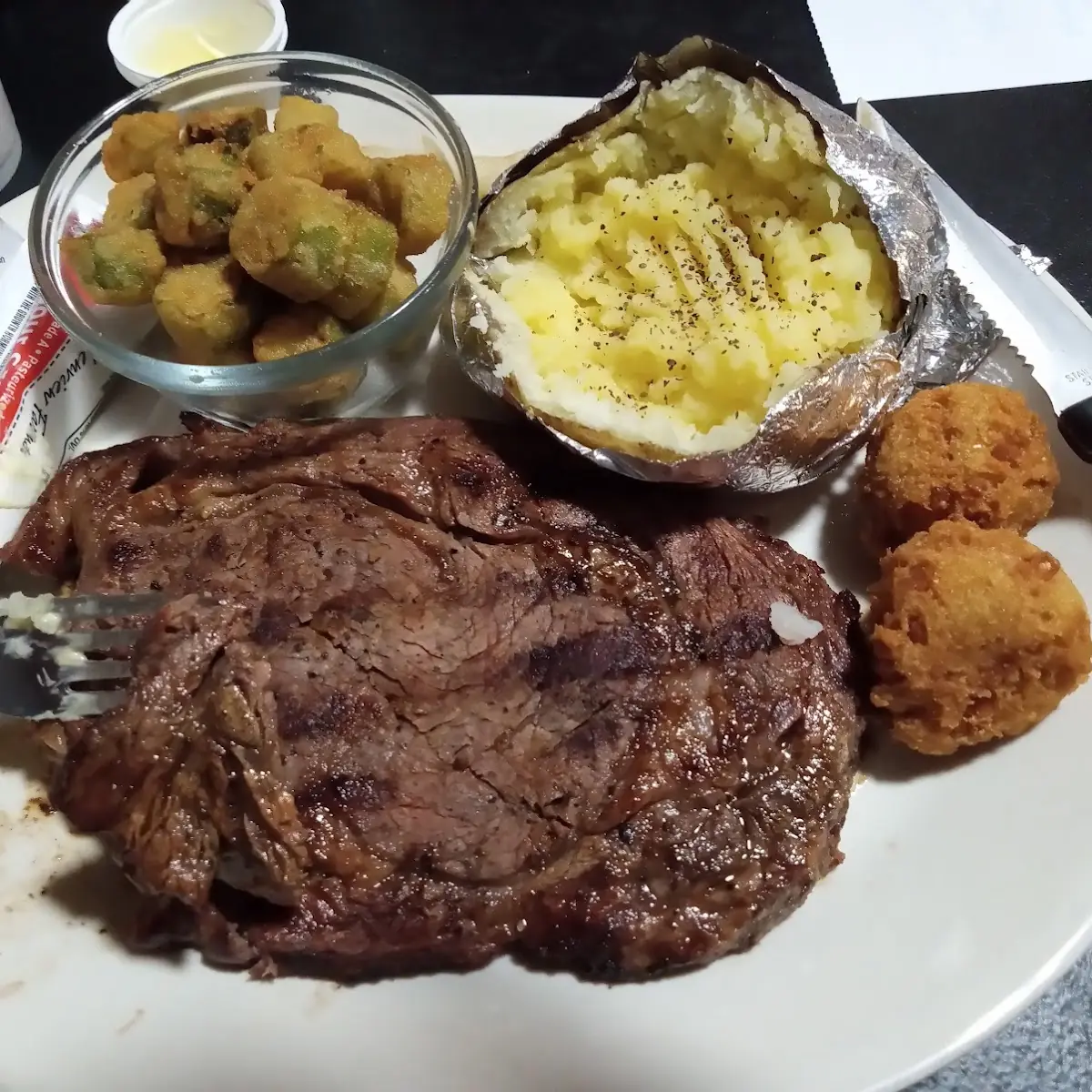 Ribeye with Baked Potato and Okra