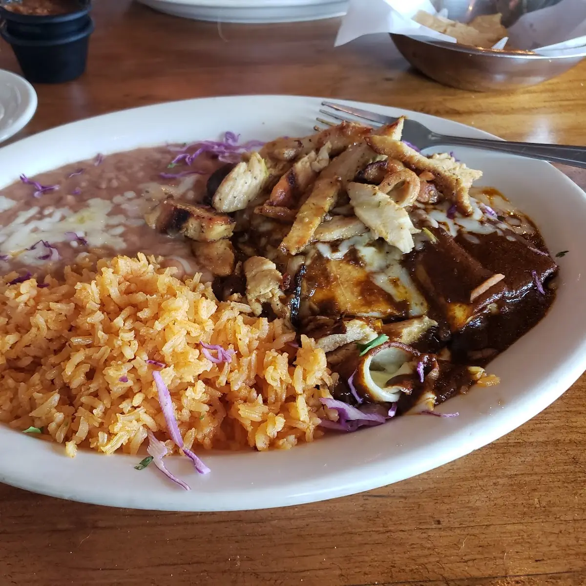 3 Cheese Enchiladas with Chicken on Top