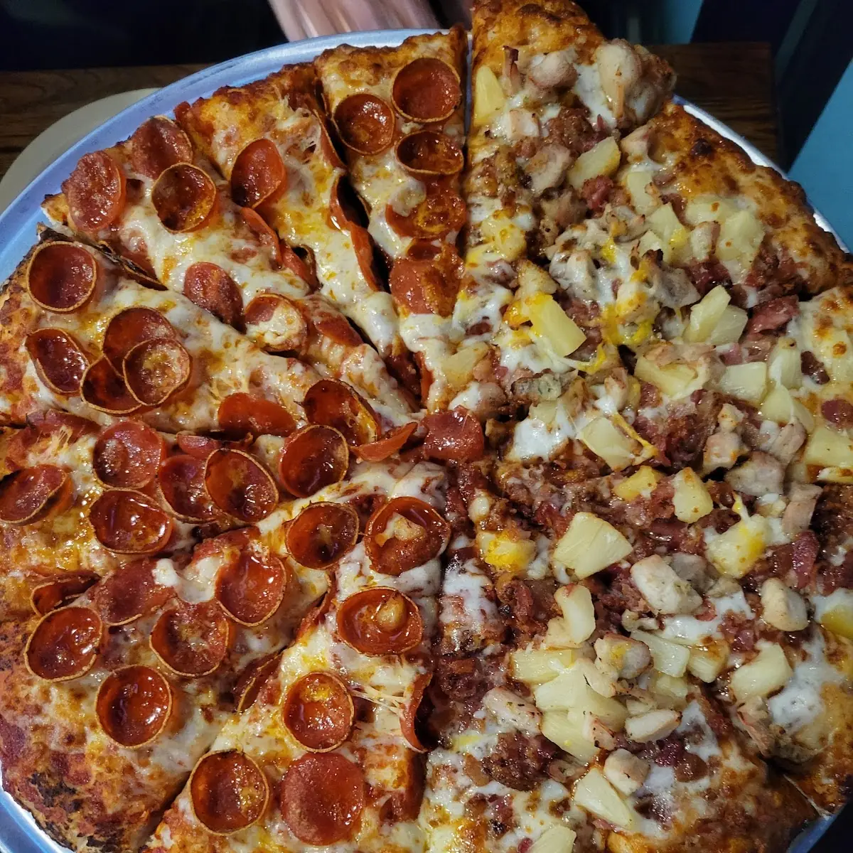 Half Pepperoni and Half Barbecue Chicken Pizza