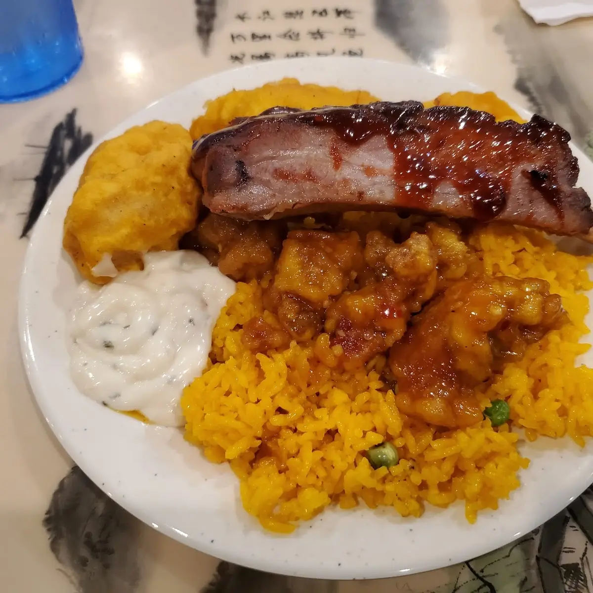 Fried Fish Ribs General Sao Chicken on Rice