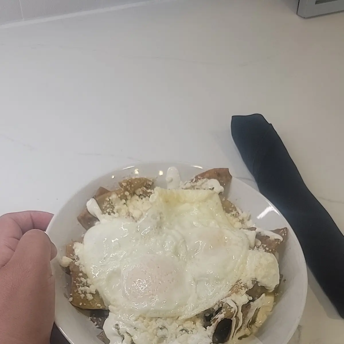 Green Chilaquiles Con Huevo