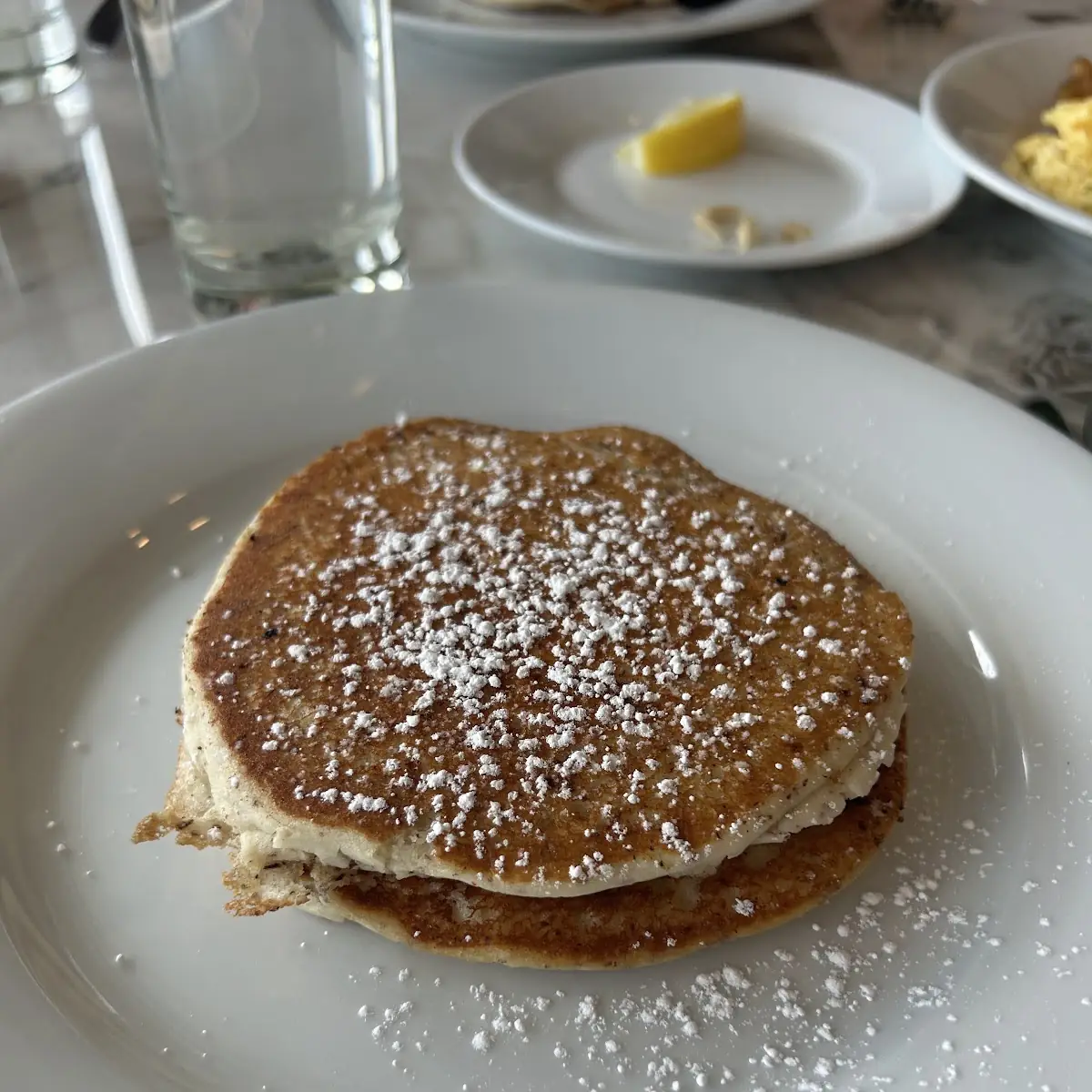 Fluffy Buttermilk Pancakes with Powdered Sugar