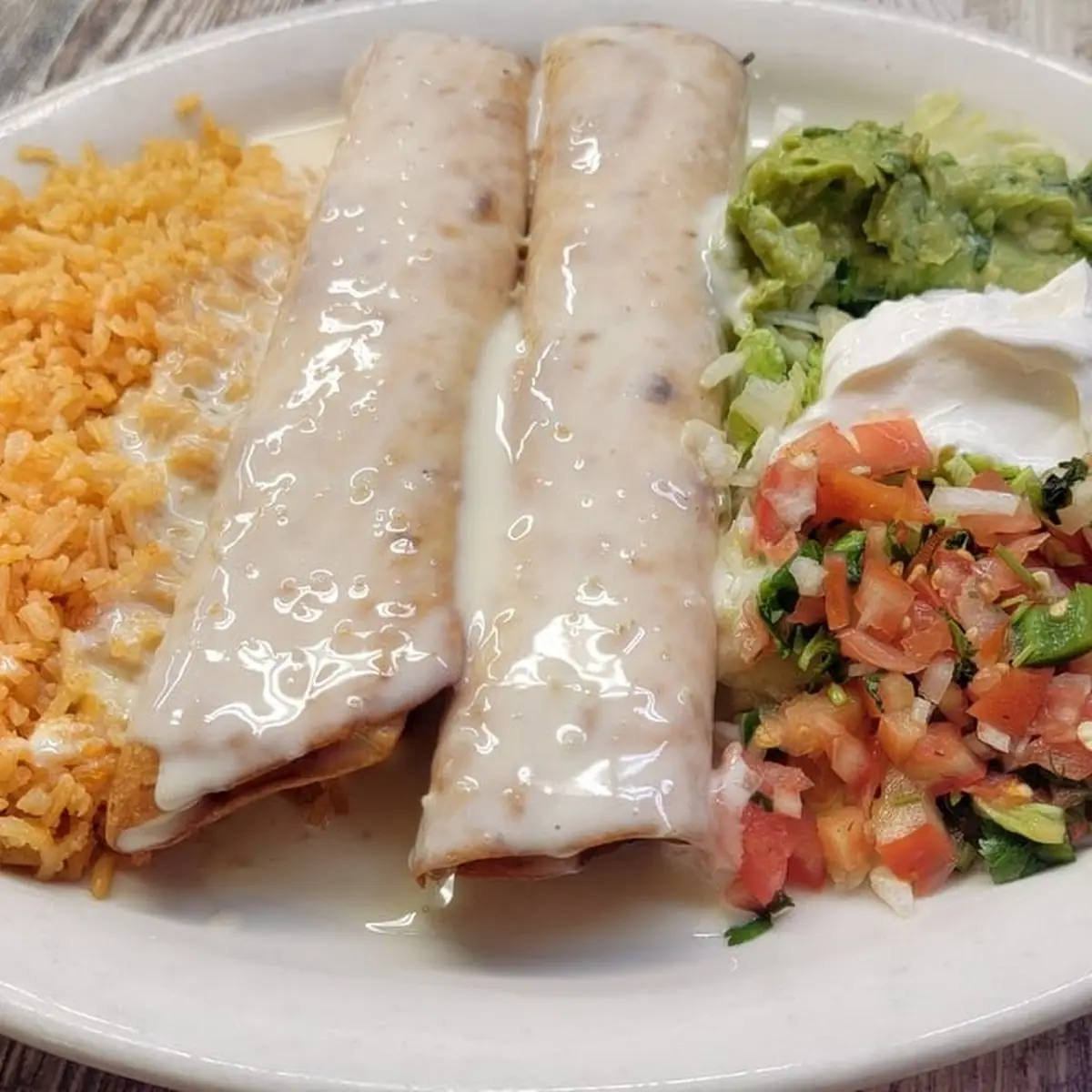 3 Cheese Enchiladas Rice and Beans