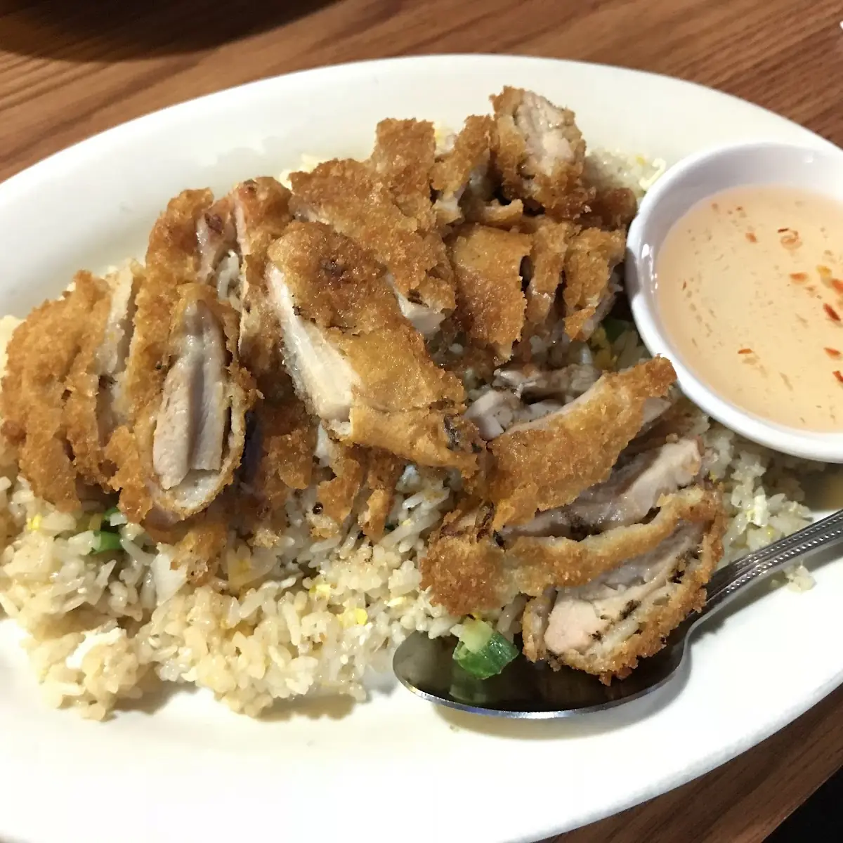 Crispy Chicken over Fried Rice Served