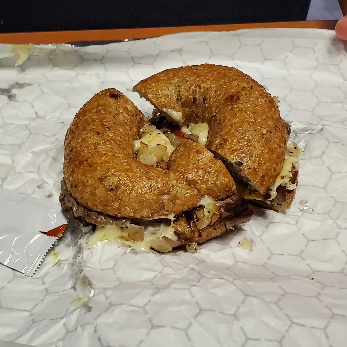 Cinnamon Raisin Bagel with Sausage and Egg