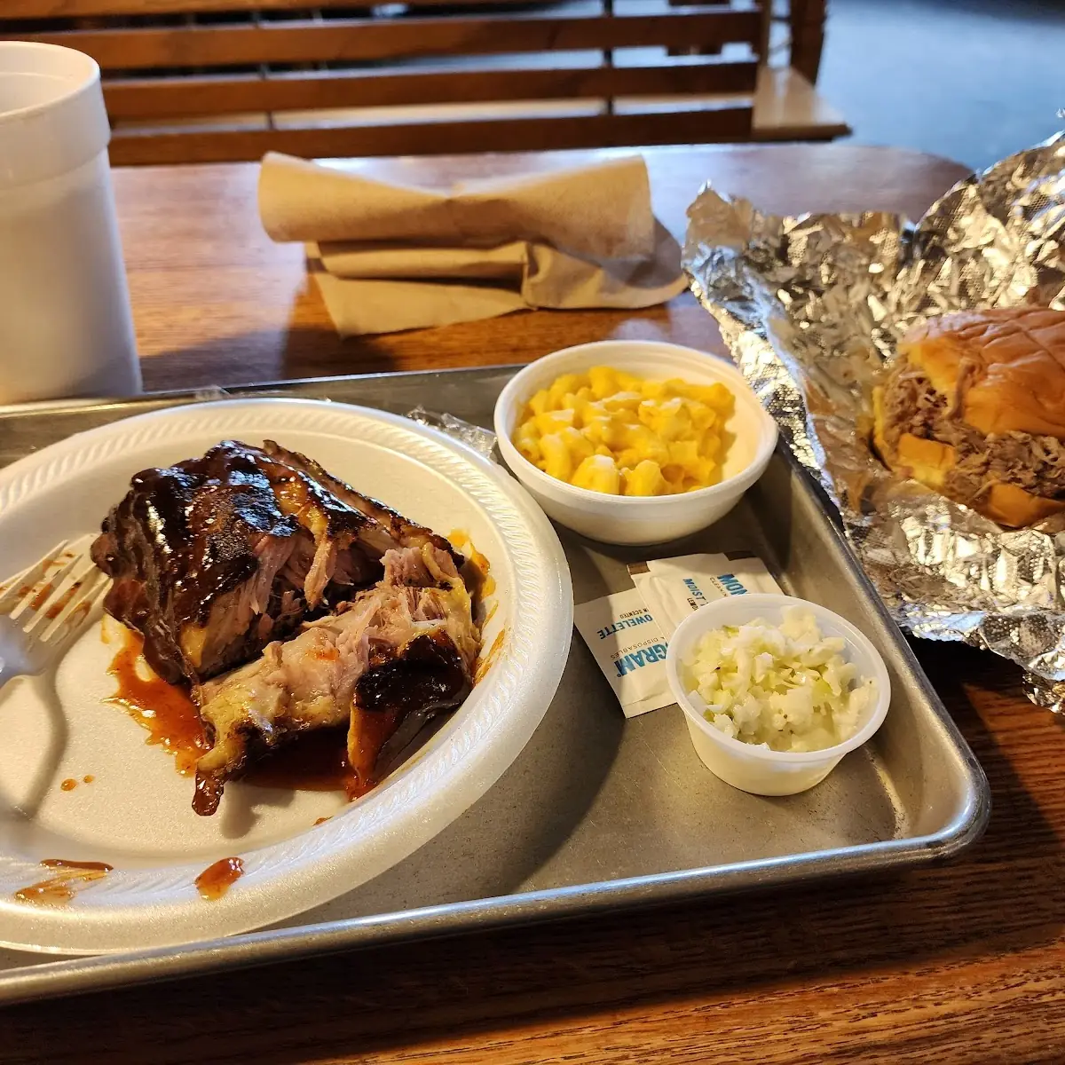 Pulled Pork Burger with 1 4 Baby Back Ribs with Mac and Cheese and Coleslaw