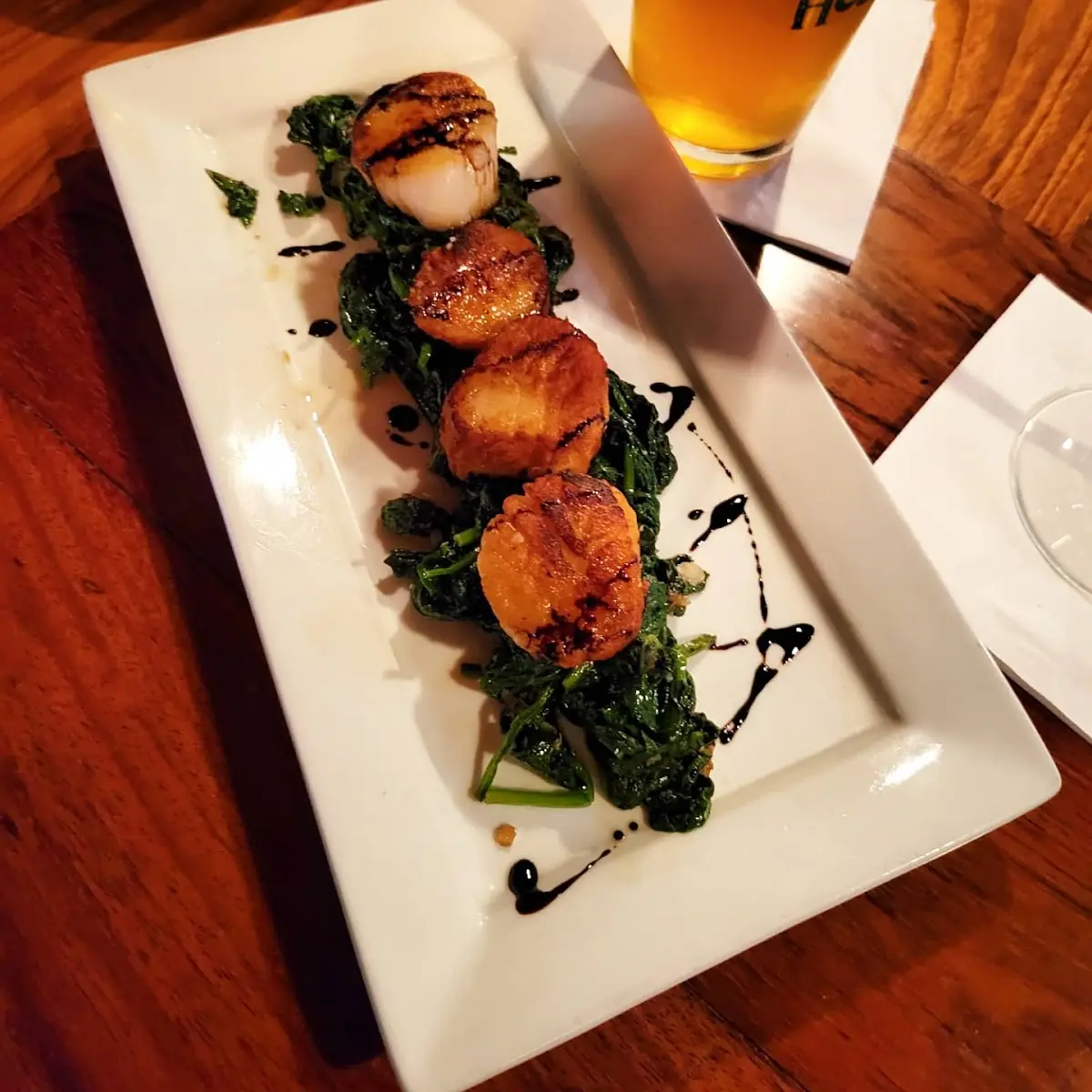 Scallops with Sautéed Spinach
