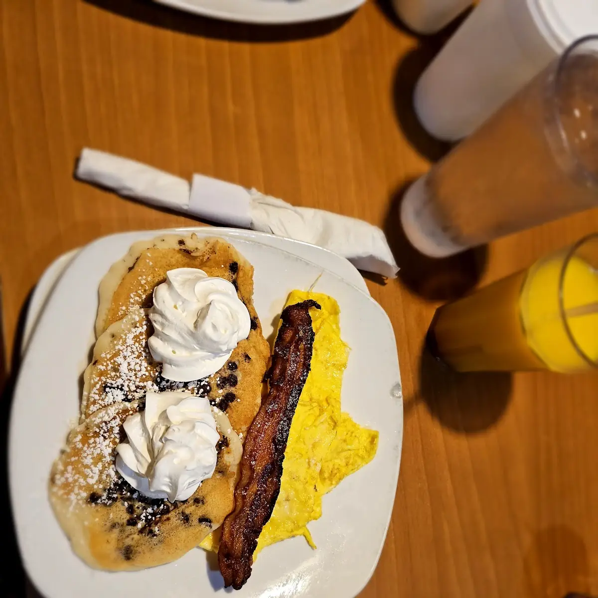 Chocolate Chip Pancakes and Bacon and Scramble Eggs
