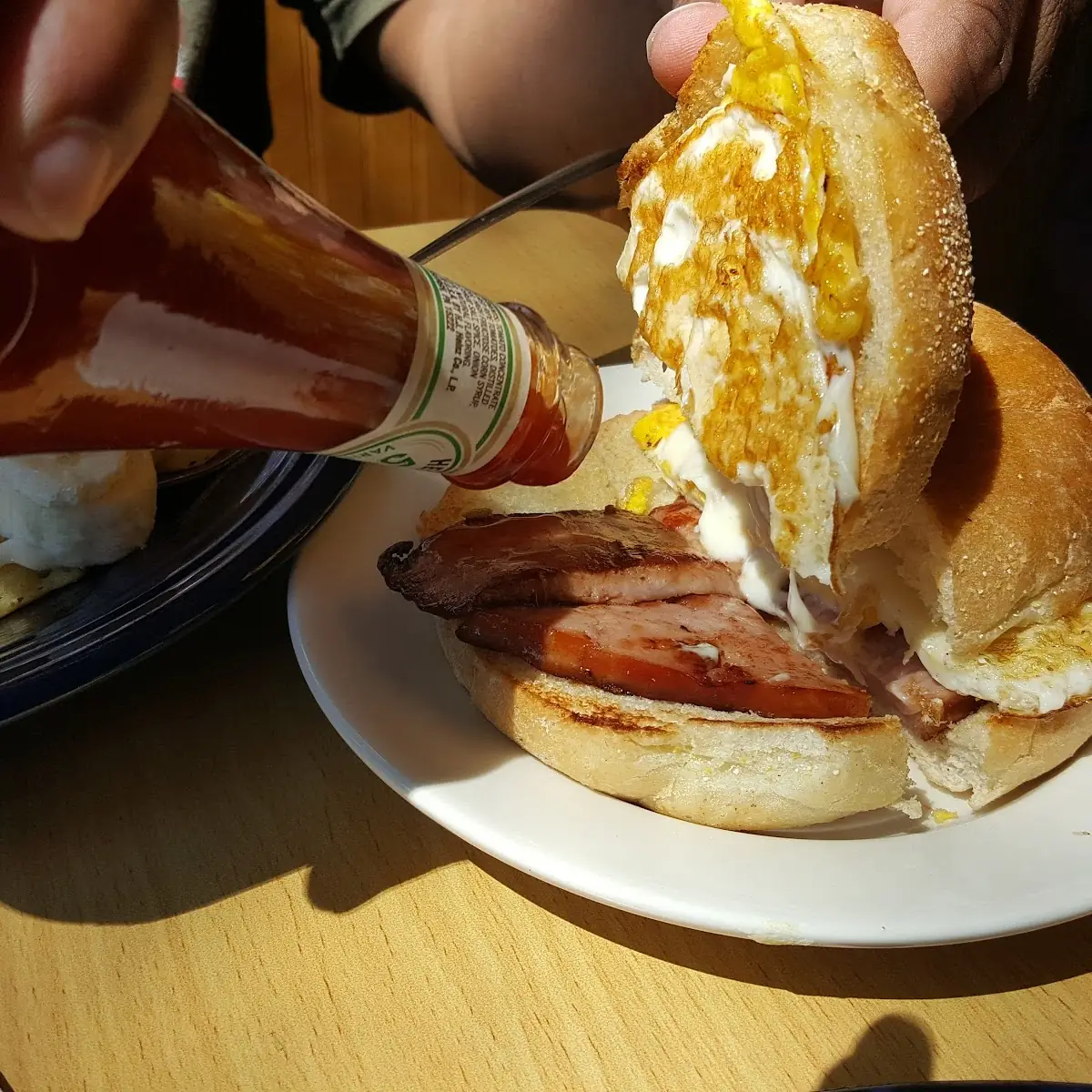 Fried Egg and Ham Breakfast Sandwich