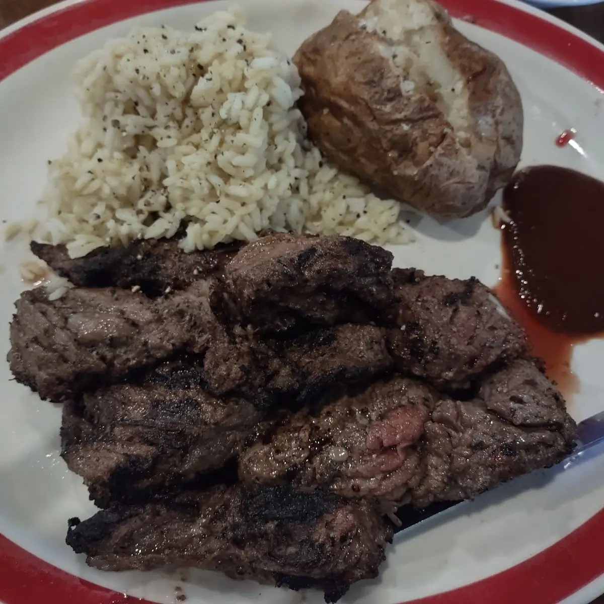 Steak Tips Baked Potato and Rice