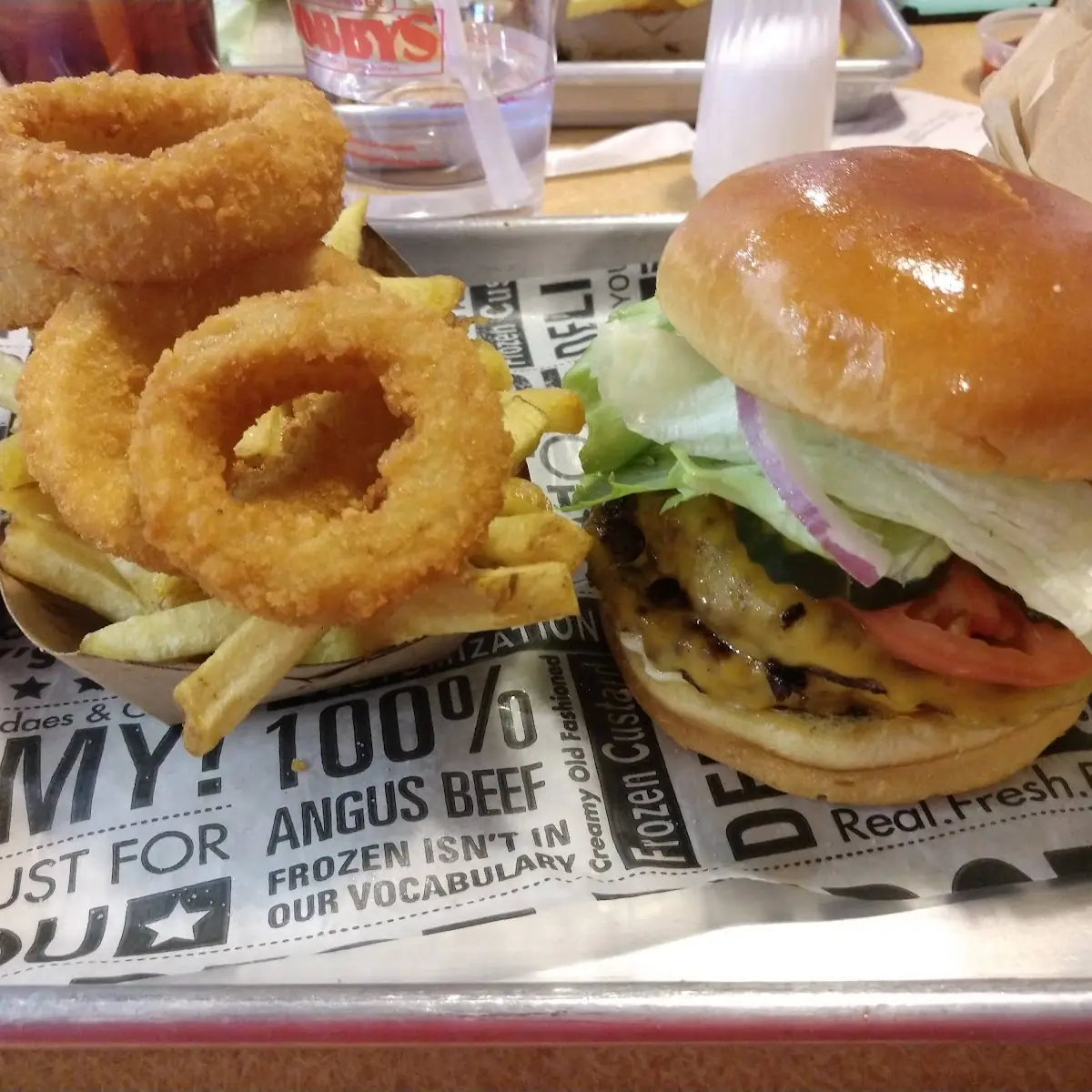Cheeseburger and Half Fries Half Onions Rings
