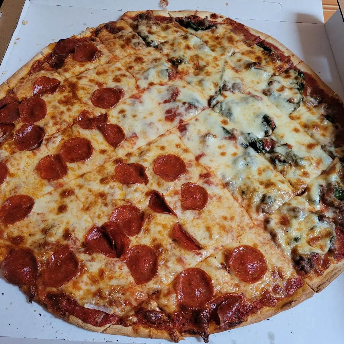 Thin Crust Pizza with Half Pepperoni Onion and Half Sausage Spinach