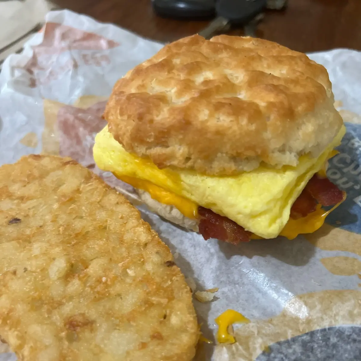 Bacon Egg and Cheese Bisquit with a Hash Brown