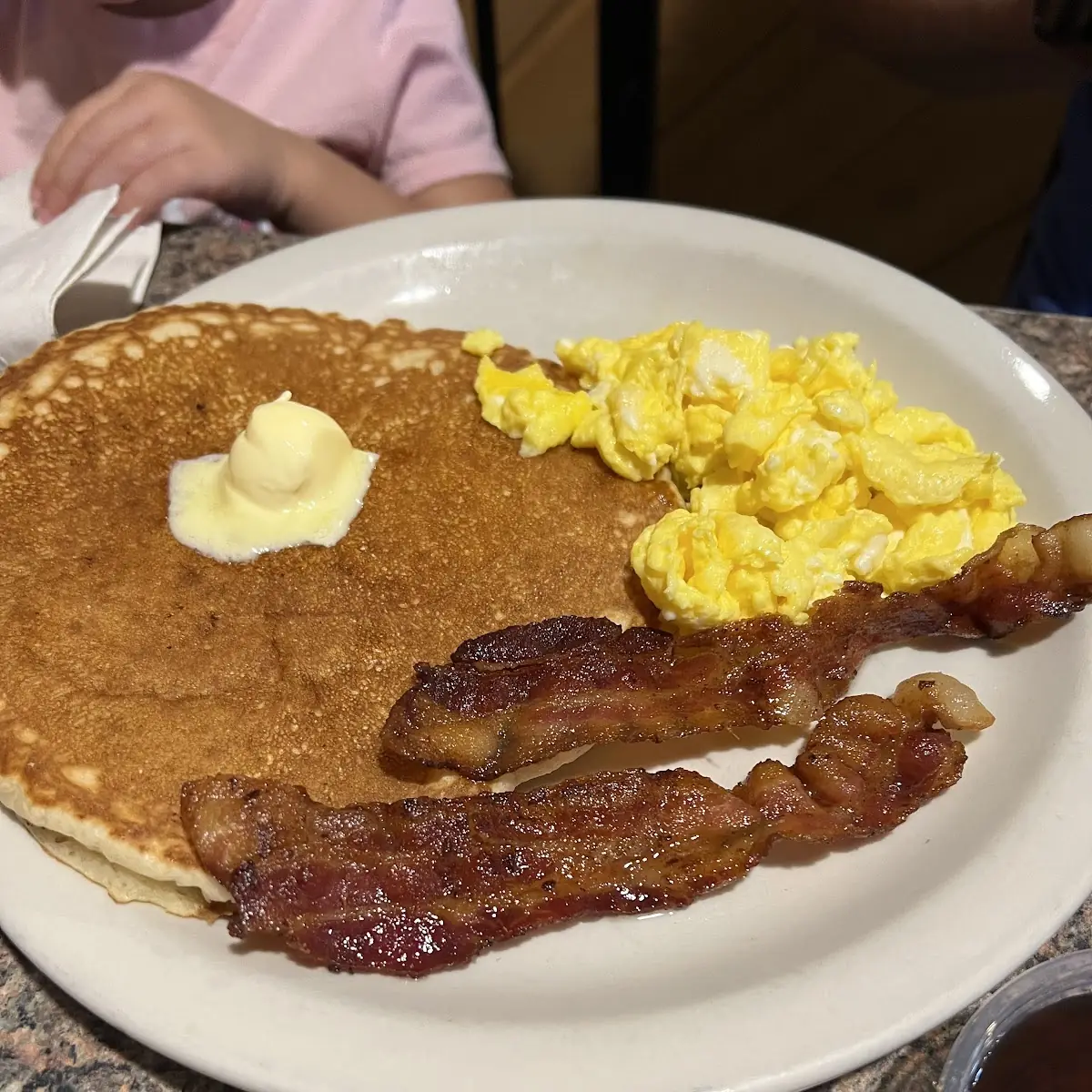 French Toast with over Easy Eggs Extra Crispy Hash Browns an Bacon