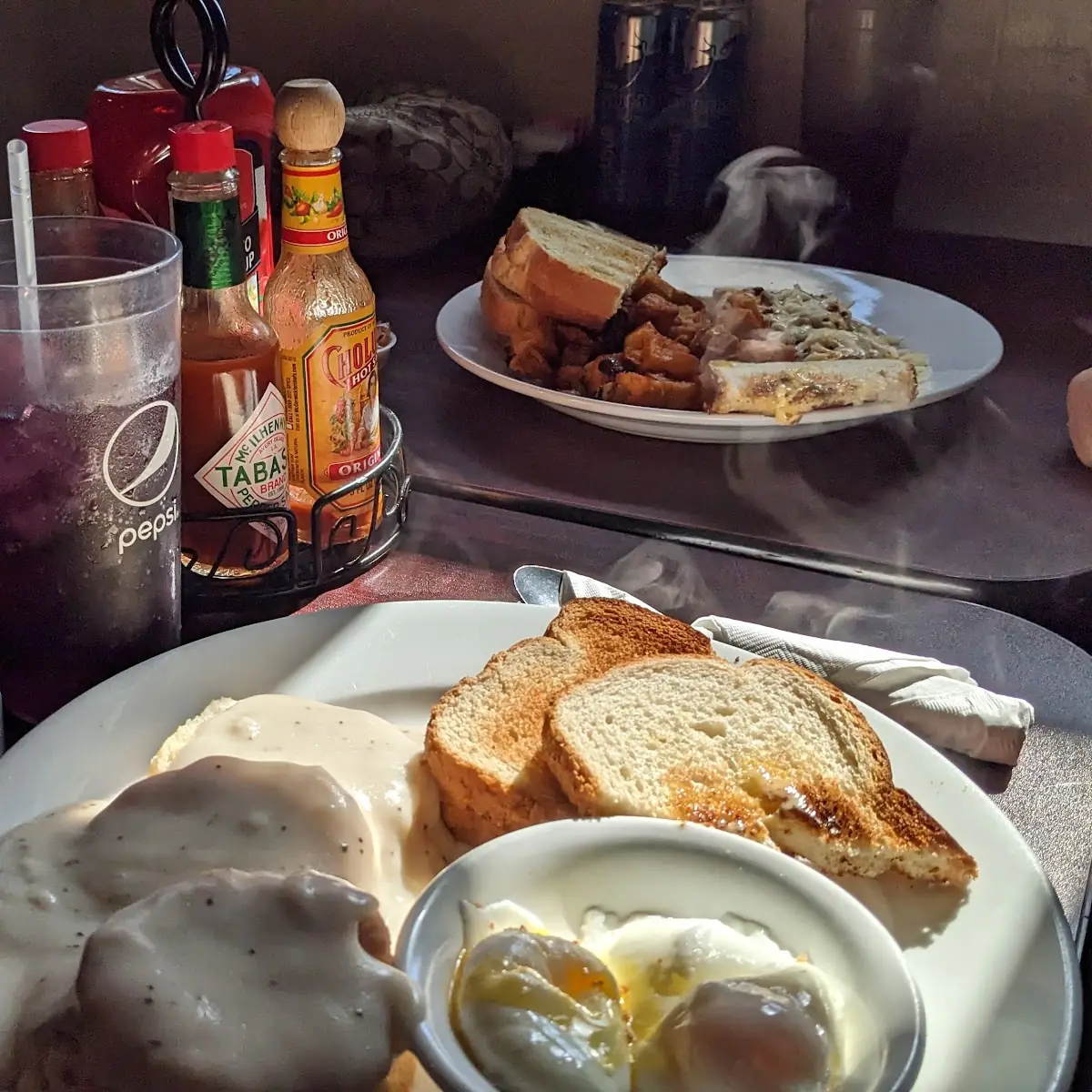 Poached Eggs Biscuits and Gravy with Toast