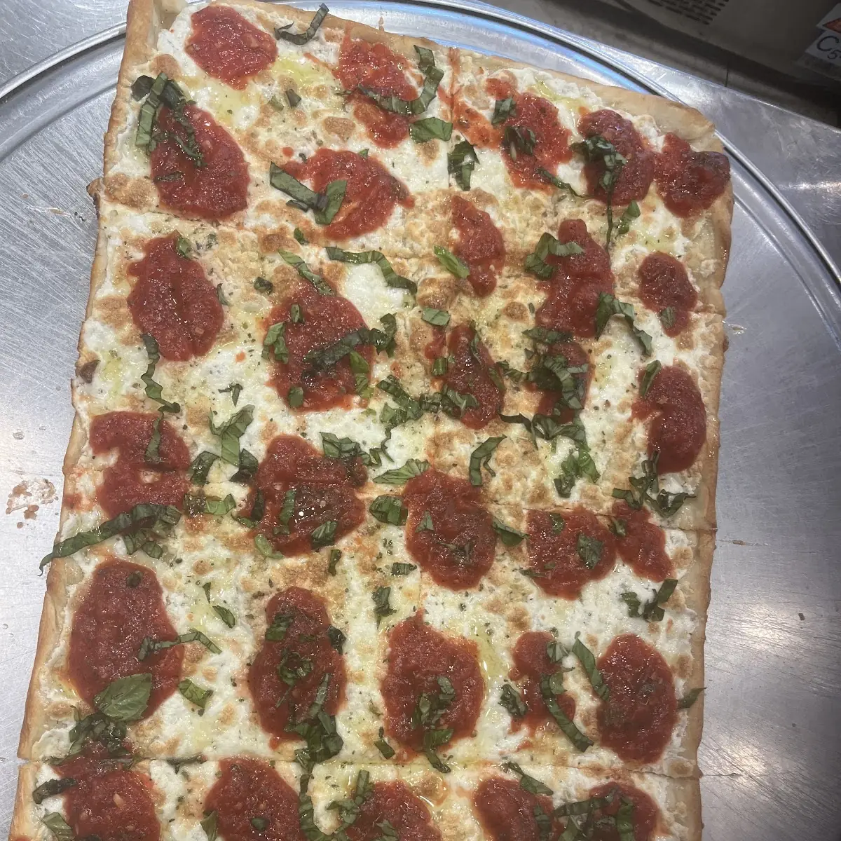 Spicy Pepperoni Grandma Pizza Slice