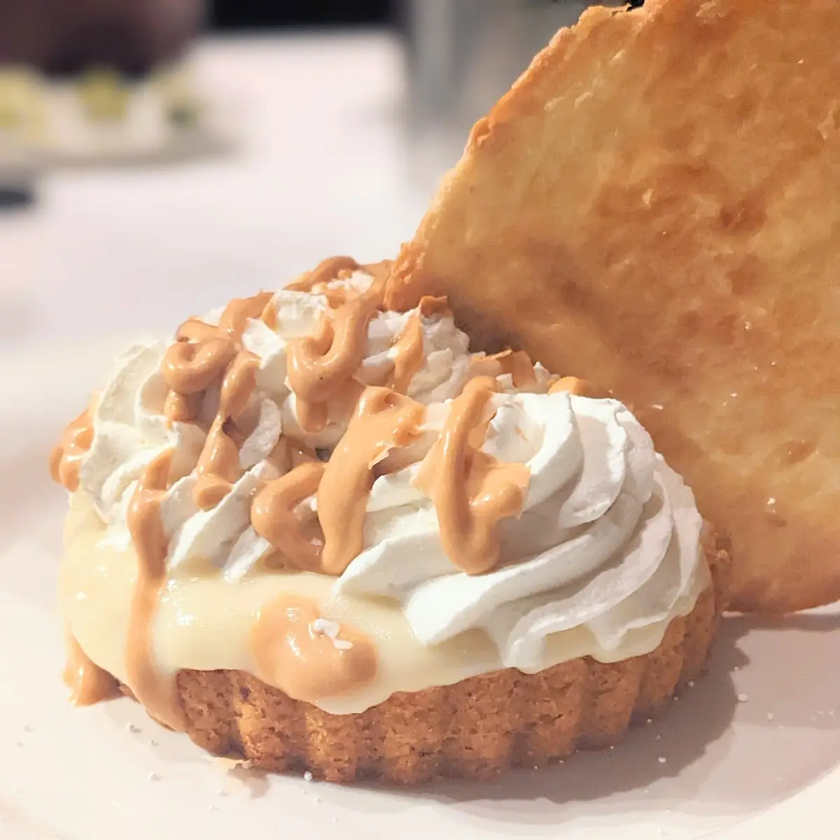 Coconut Cream Pie with House Made Rum Caramel Sauce