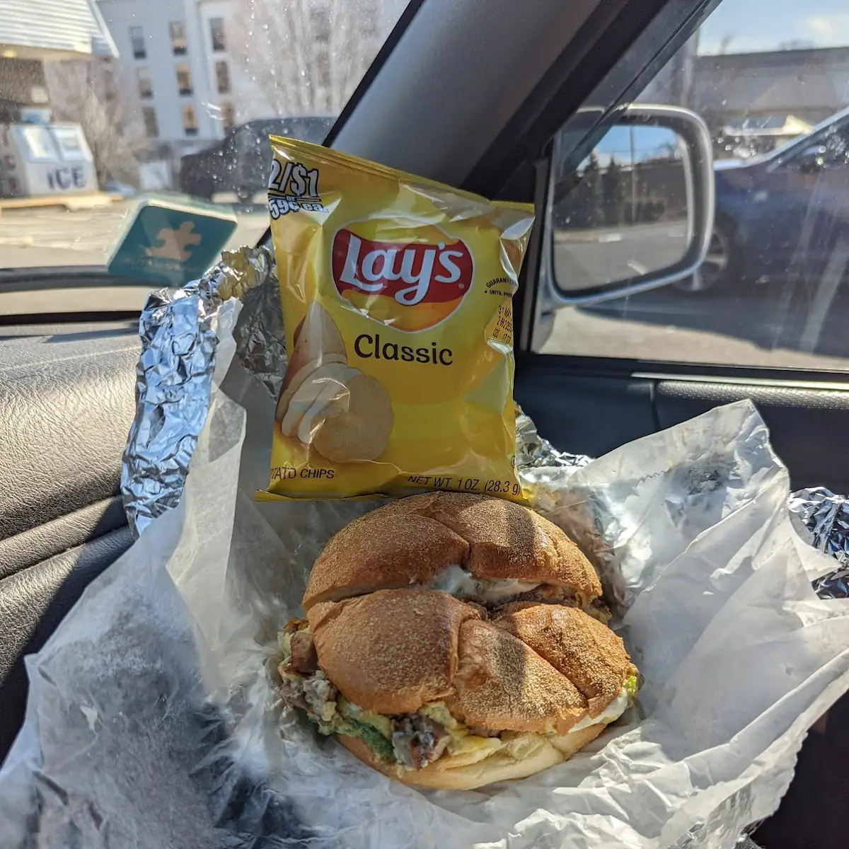 Sausage Egg on a Roll with Grilled Onions