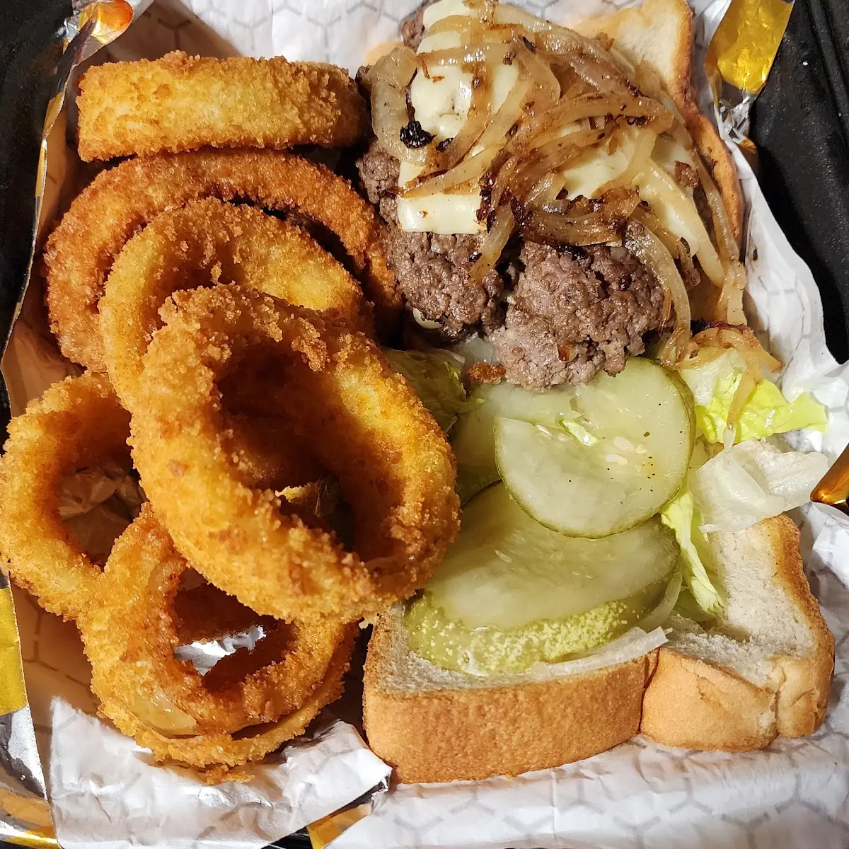 Double Cheese Burger with Everything and Grilled Onions with Side of Onion Rings