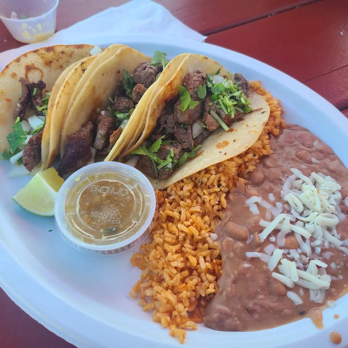 2 Beef Tacos Rice & Beans