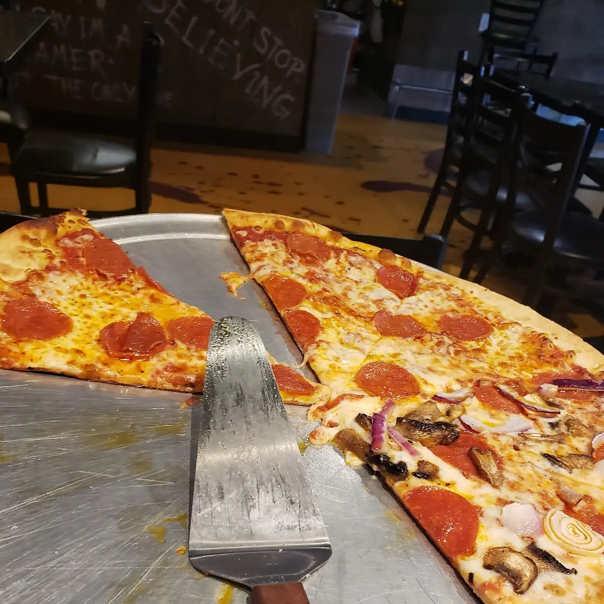 Half Pepperoni Pizza Half Supreme Pizza
