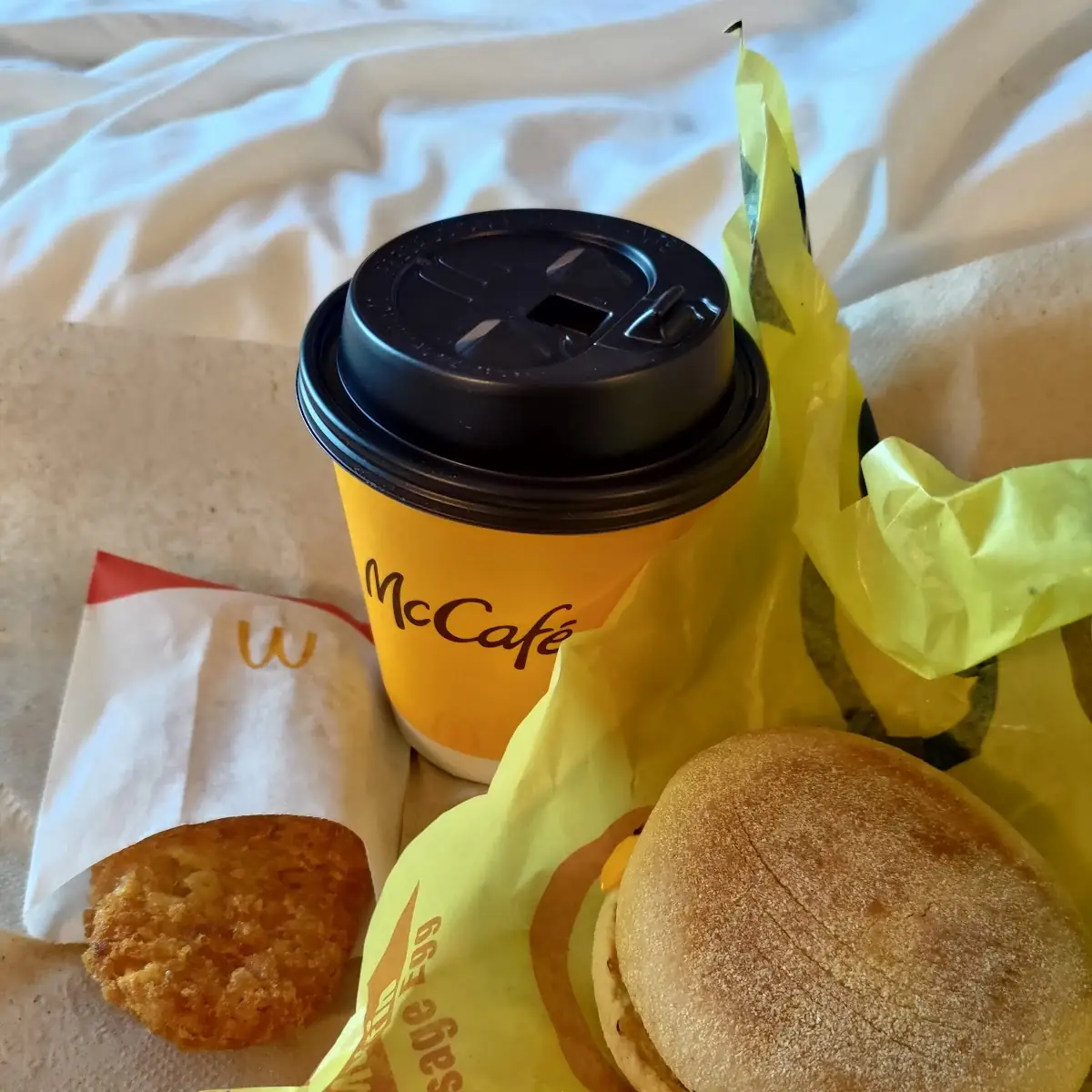 Sausage Mcmuffin and Hash Brown and Coffee