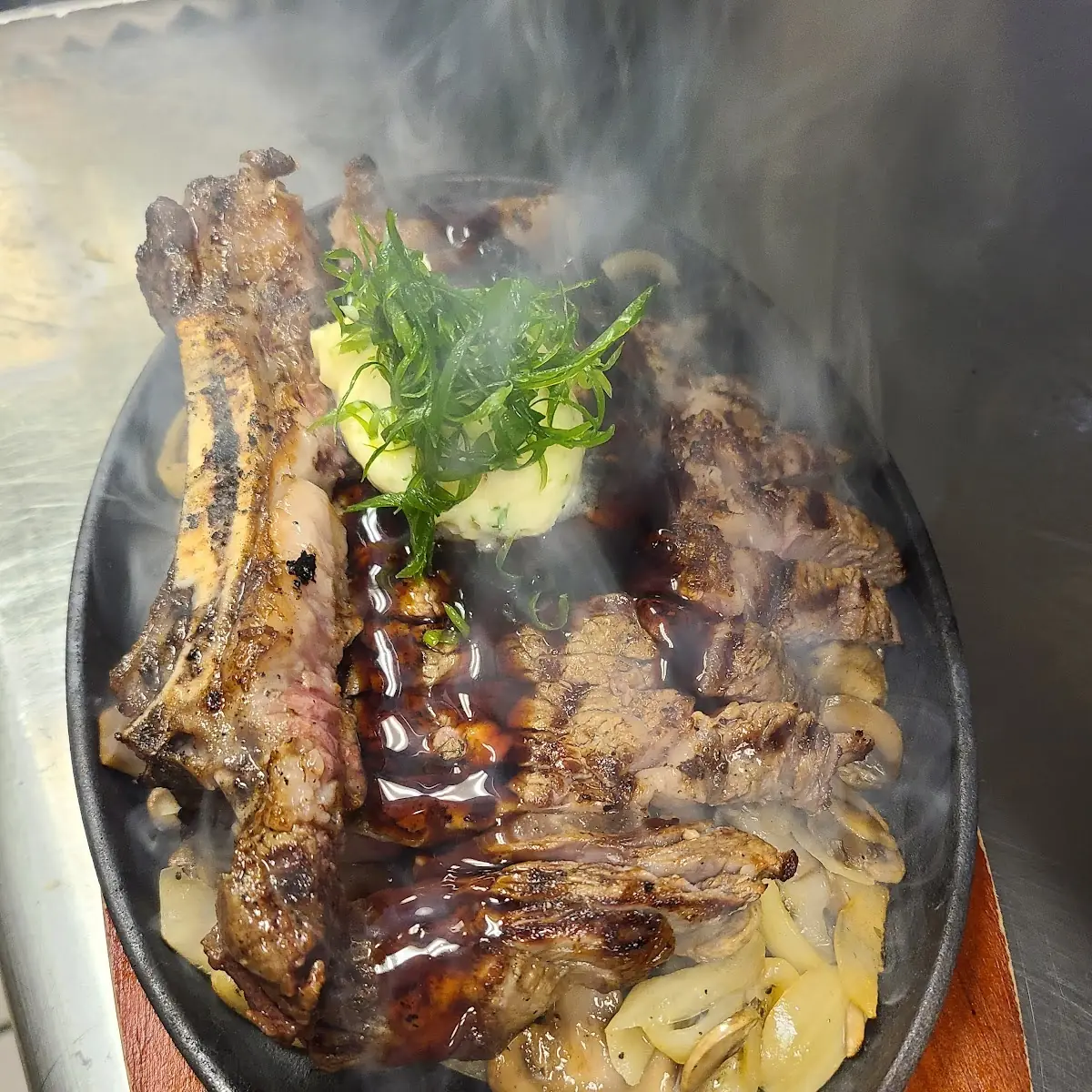 Sizzling Bone-In Rib Eye