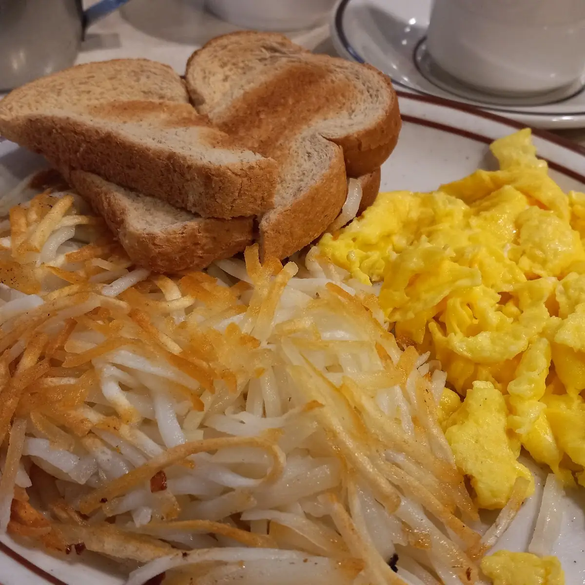 Scrambled Eggs Hash Browns and Toast