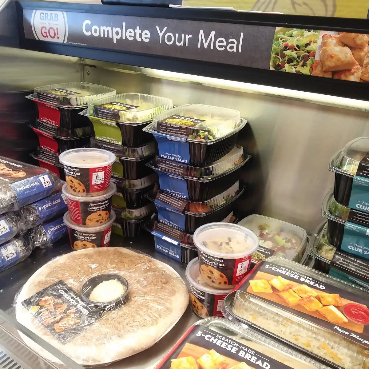 Side Dishes Available Salads Cheesy Bread Cookie Dough Cinnamon Roll Wheel
