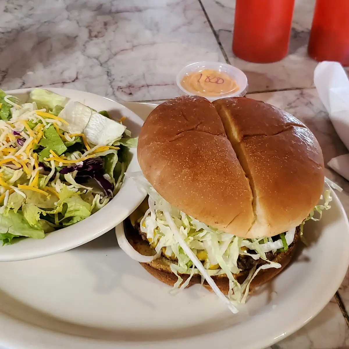 Cheeseburger with a Side Salad