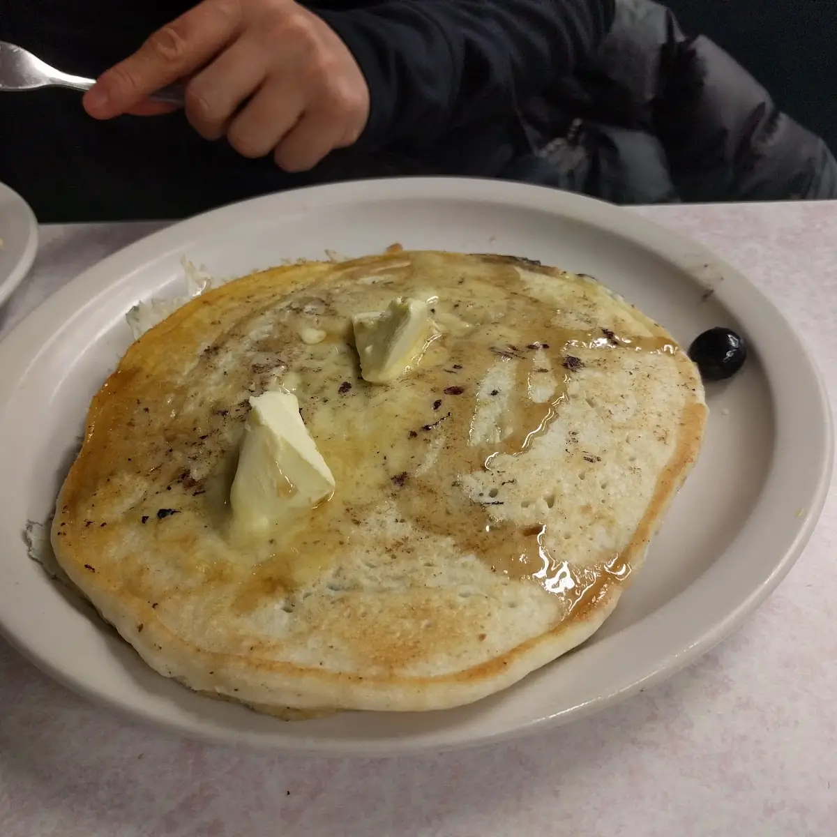 Blueberry Pancakes Dripping with Butter
