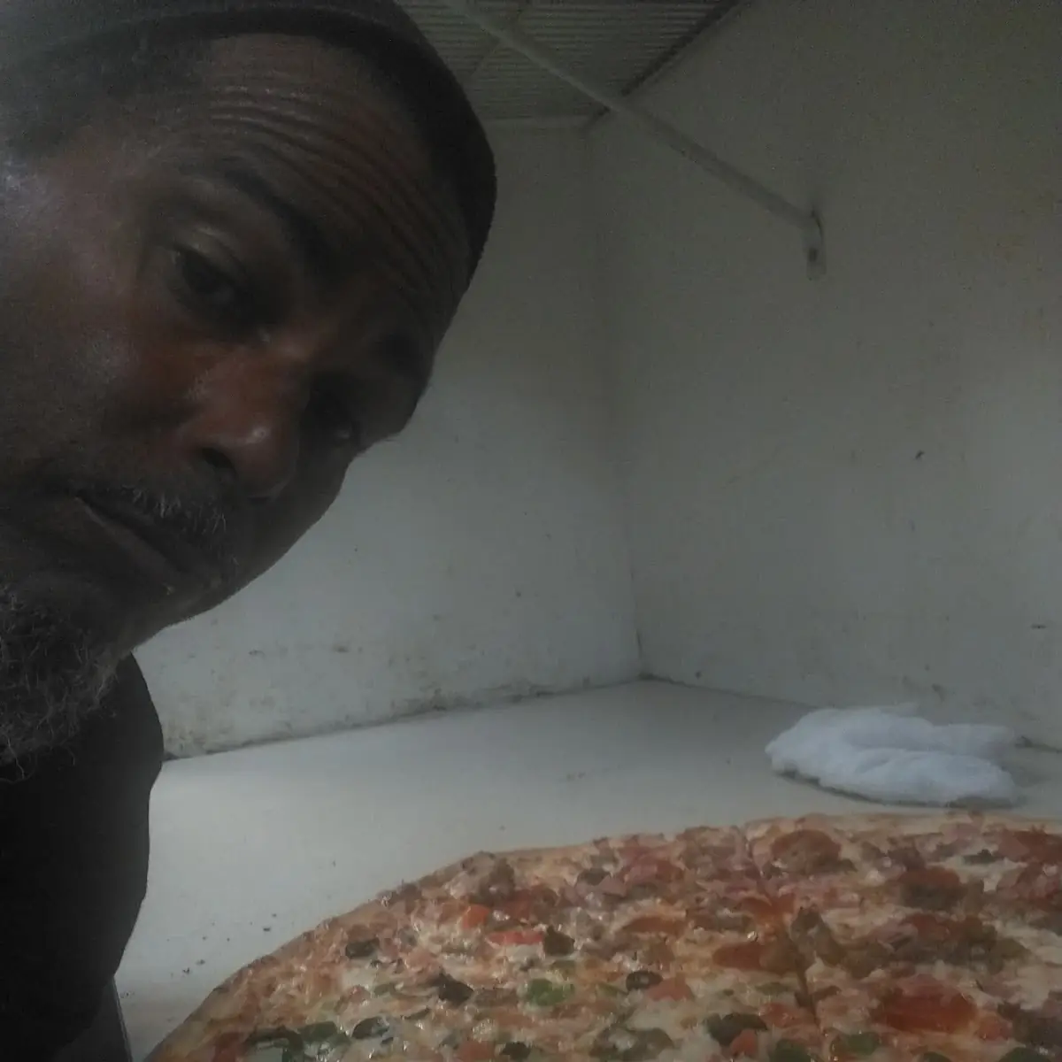 Half Meat Lovers Pizza Half Supreme Pizza