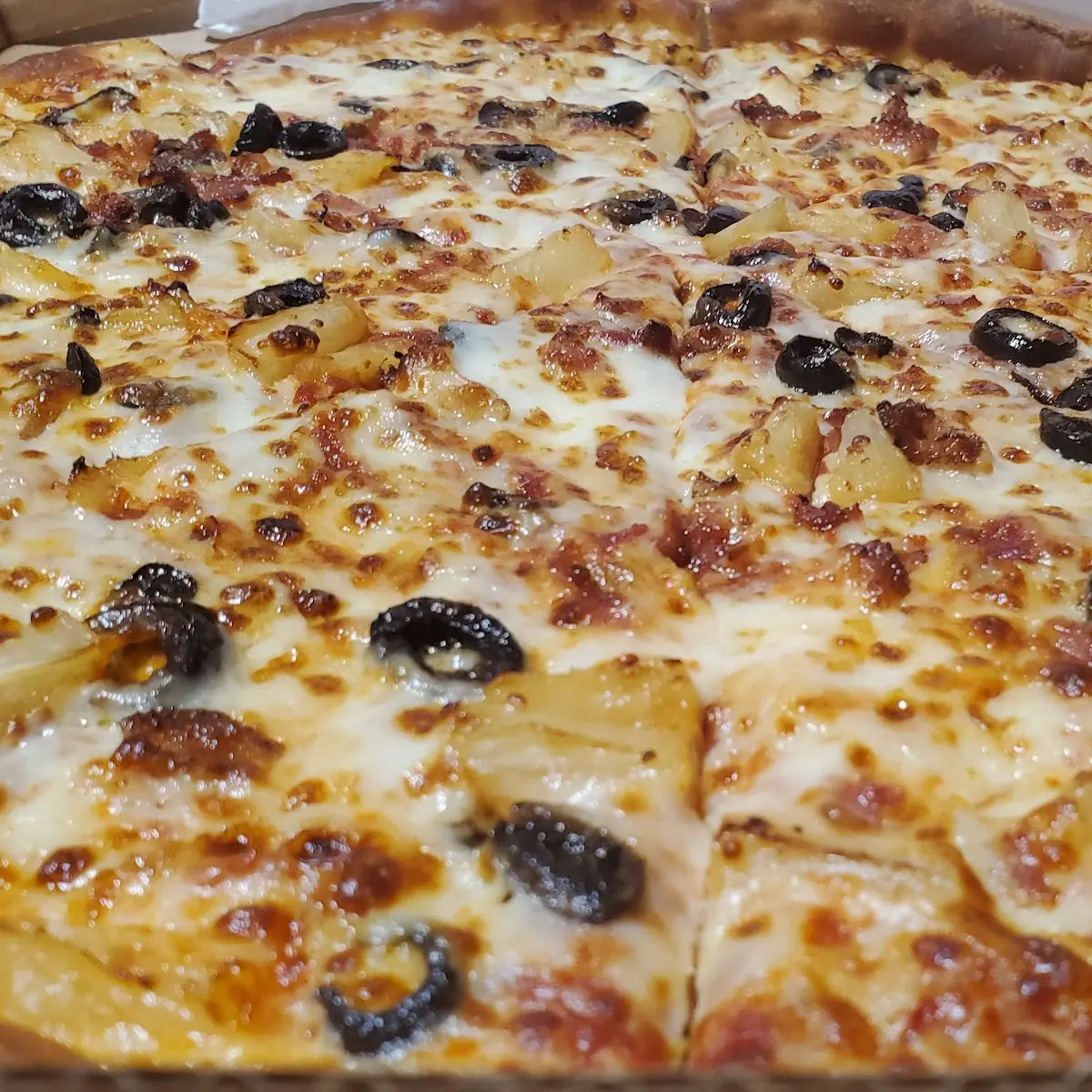 Thin and Crispy Bacon and Black Olive Pizza