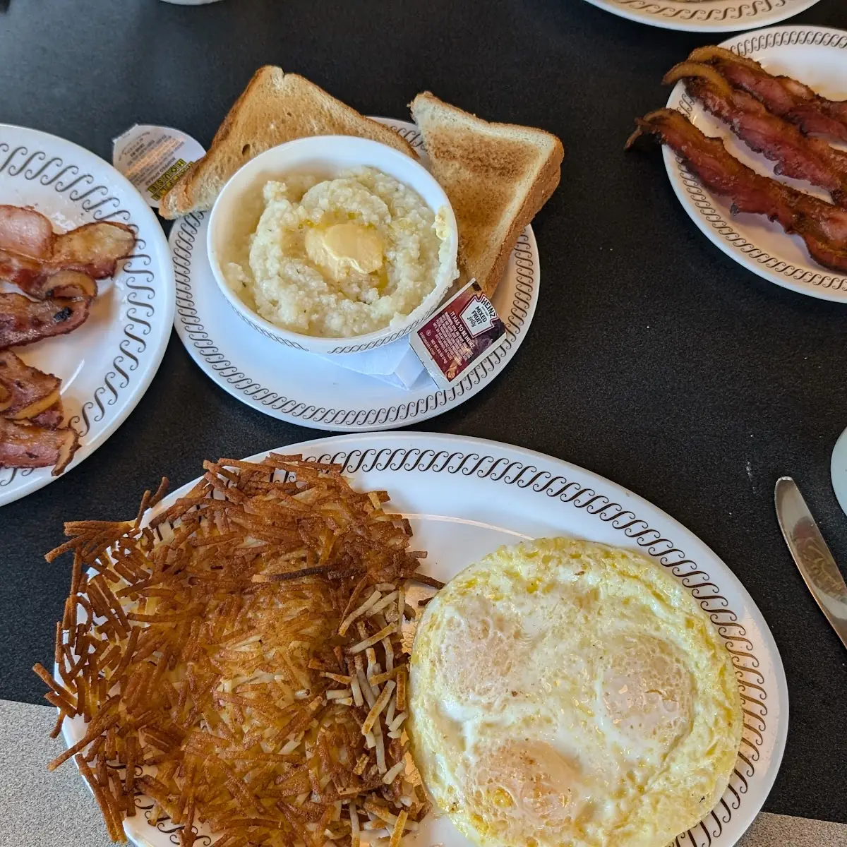 Eggs Hash Browns Bacon and Grits