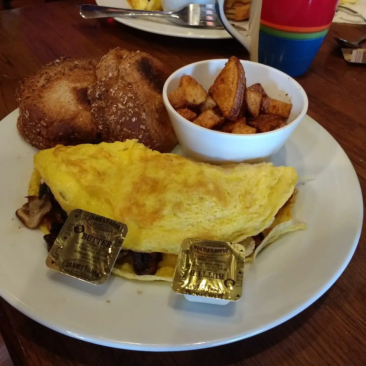Three Eggs Omelette Side of Potatoes